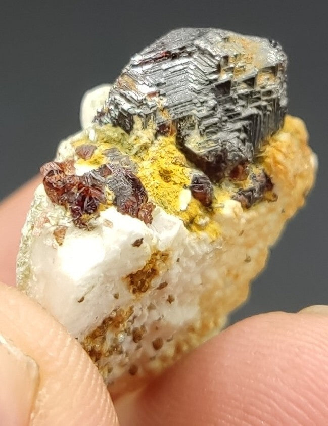 An aesthetic specimen of spessartine garnets on albite/feldspar 15 grams