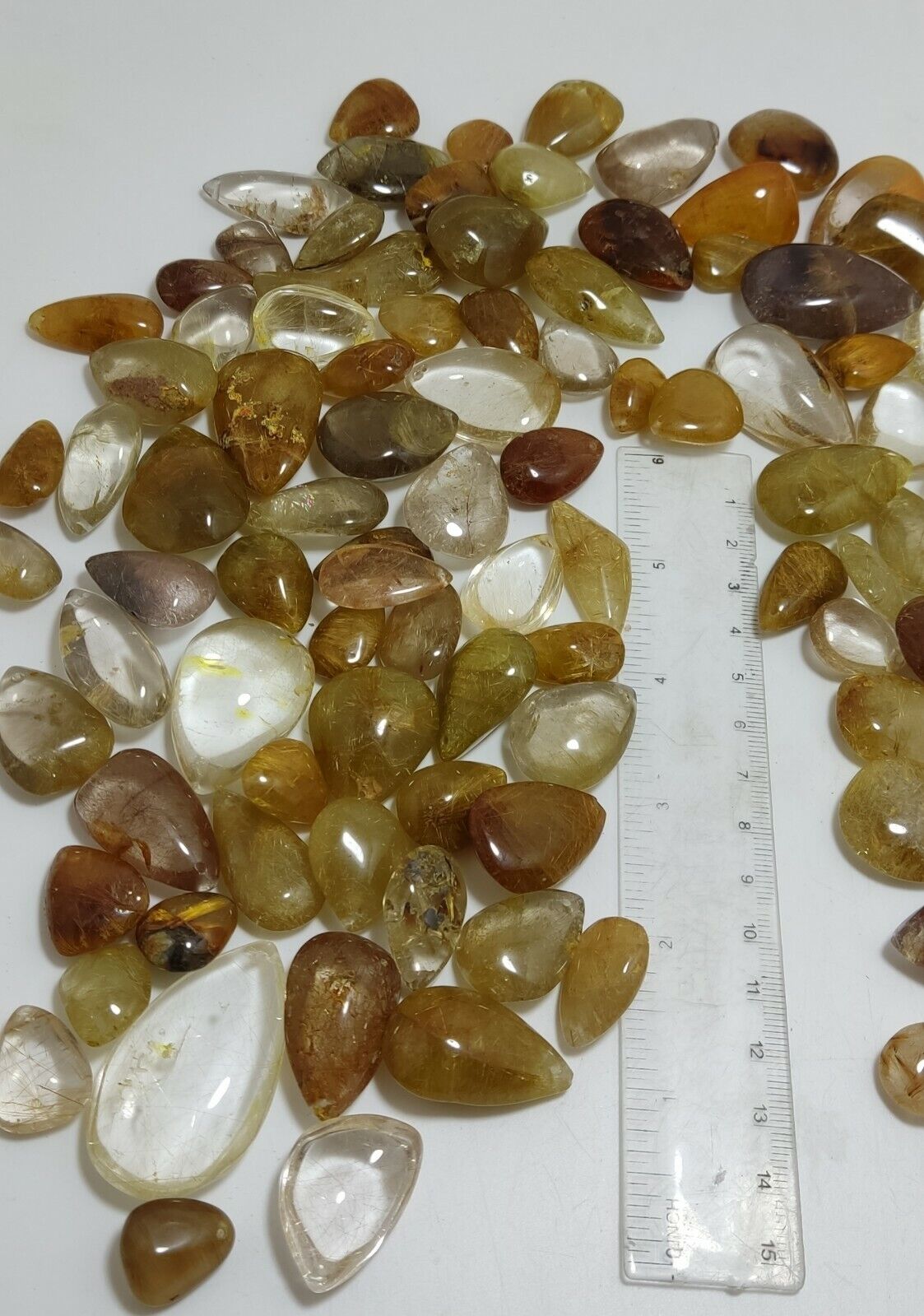 780 grams Rutilated polished quartz tumbles-cabochons