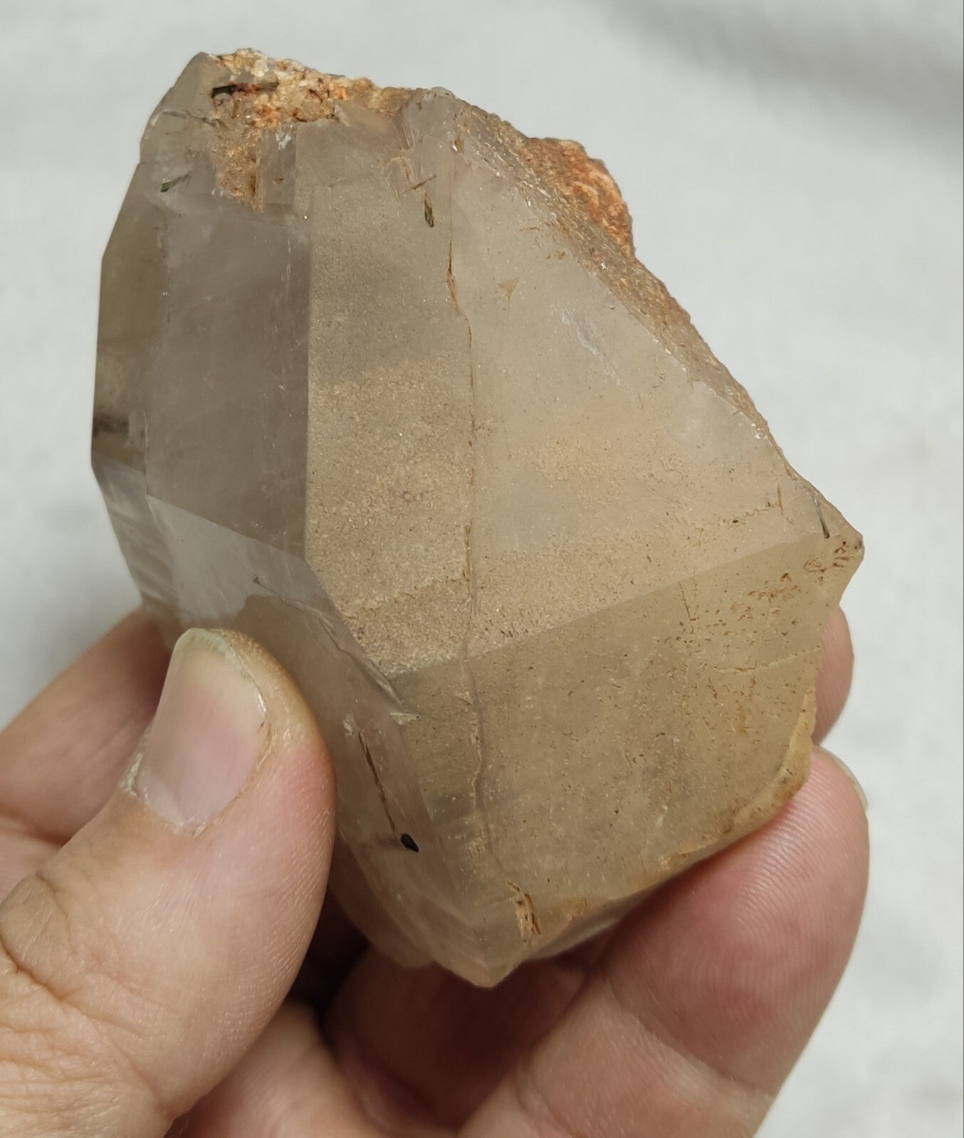 An Aesthetic terminated Quartz floater with needle inclusions 265 grams