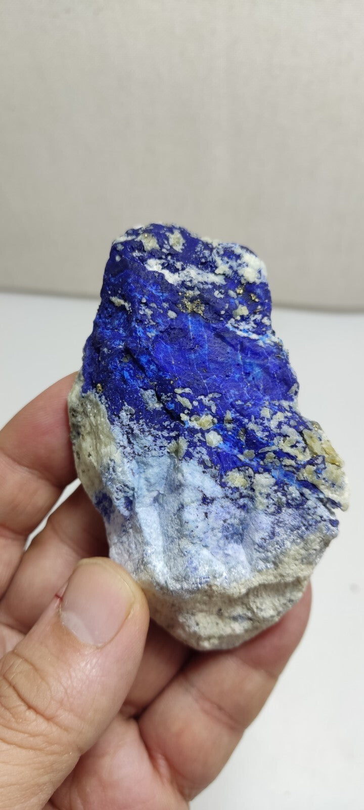 An Aesthetic specimen of fluorescent Lazurite with Pyrite 128 grams