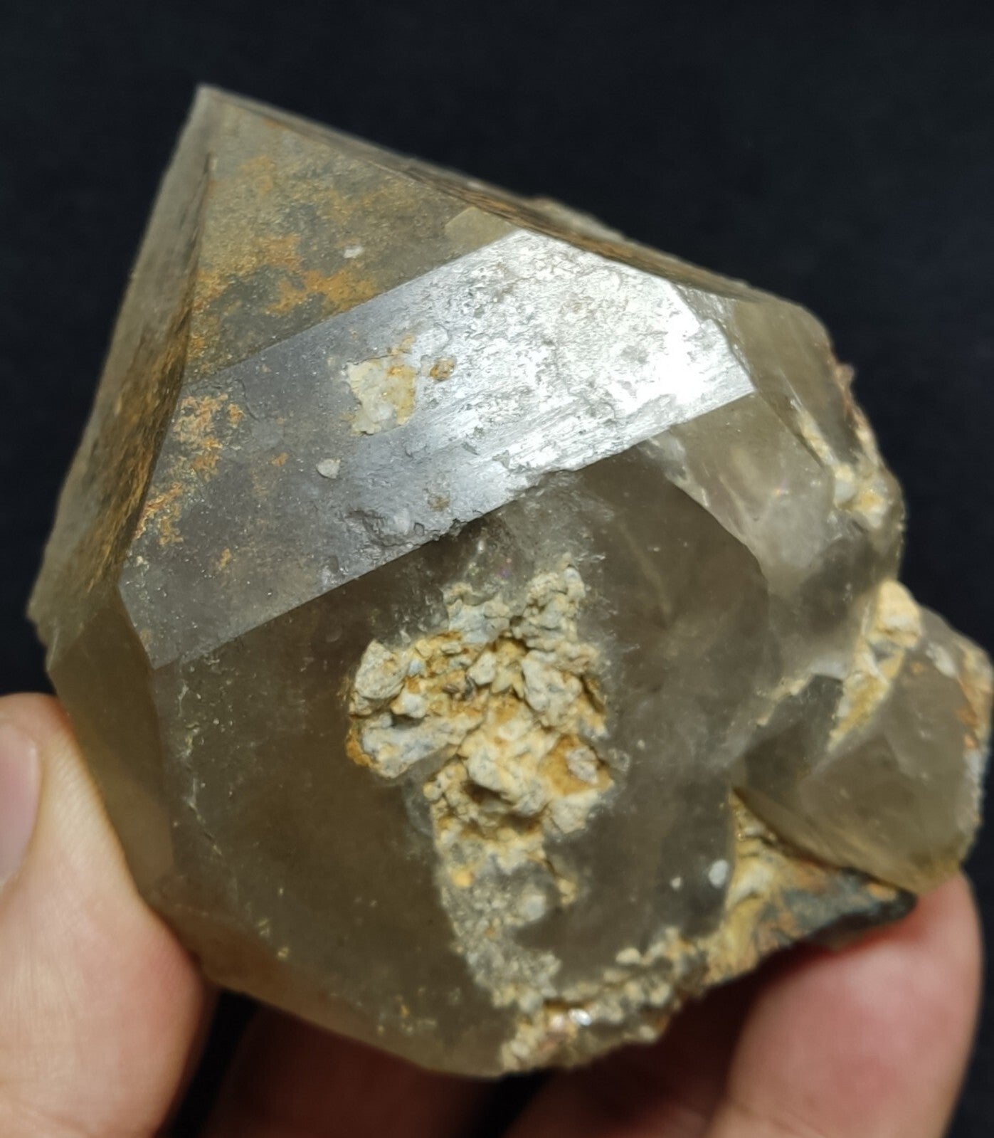 An Aesthetic terminated Quartz floater with rutiles and hematite 399 grams