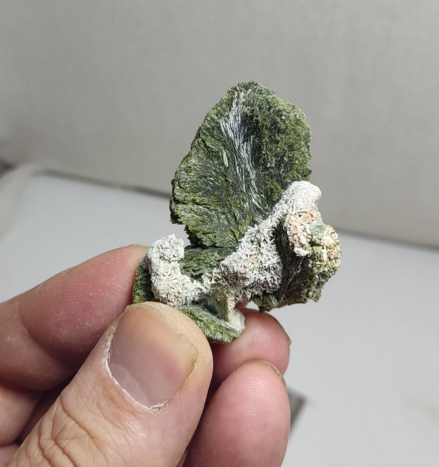 An aesthetic specimen of epidote crystal spray type 34 grams