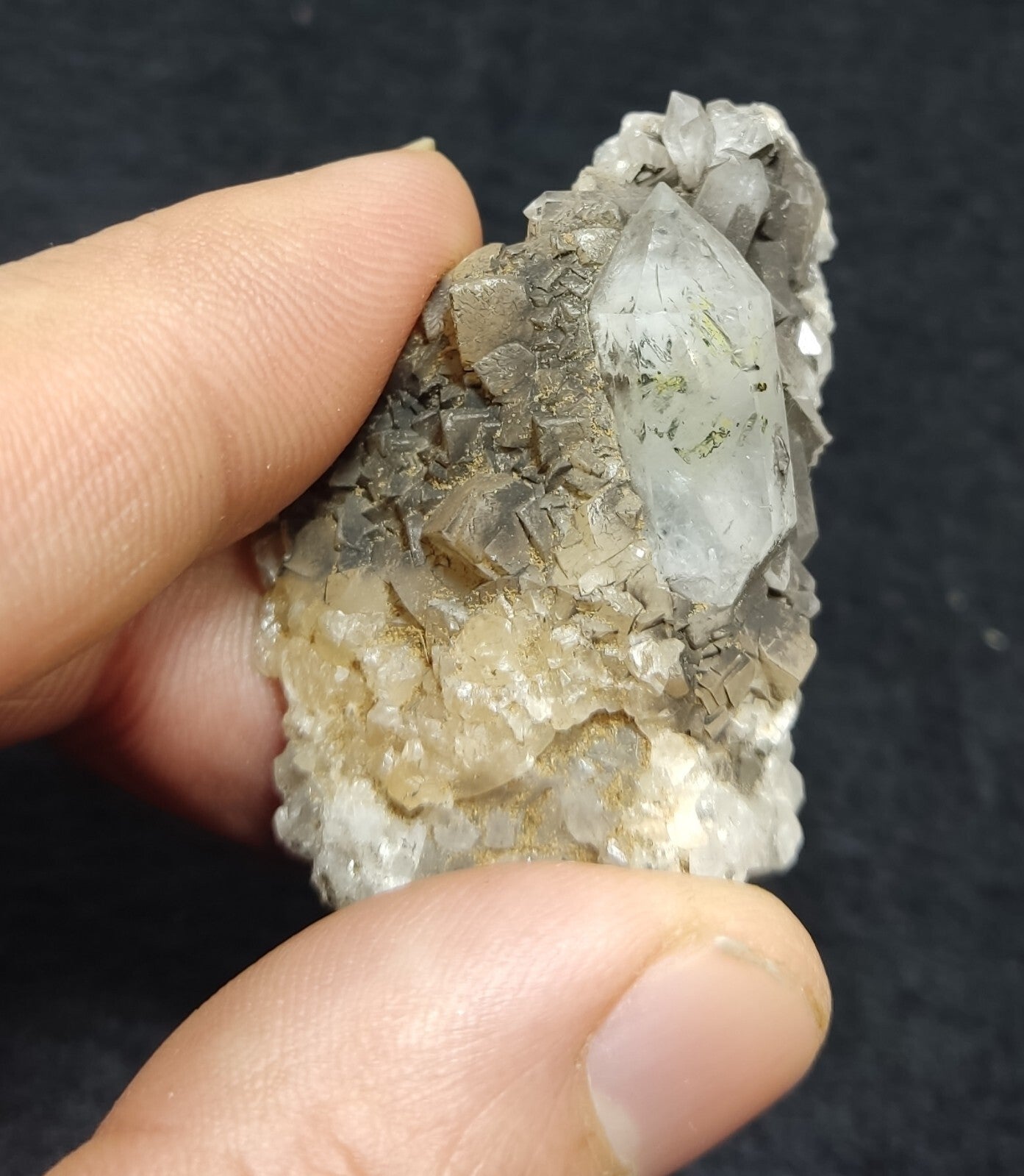 An Aesthetic quartz/calcite crystal specimen with petroleum inclusions 23 grams