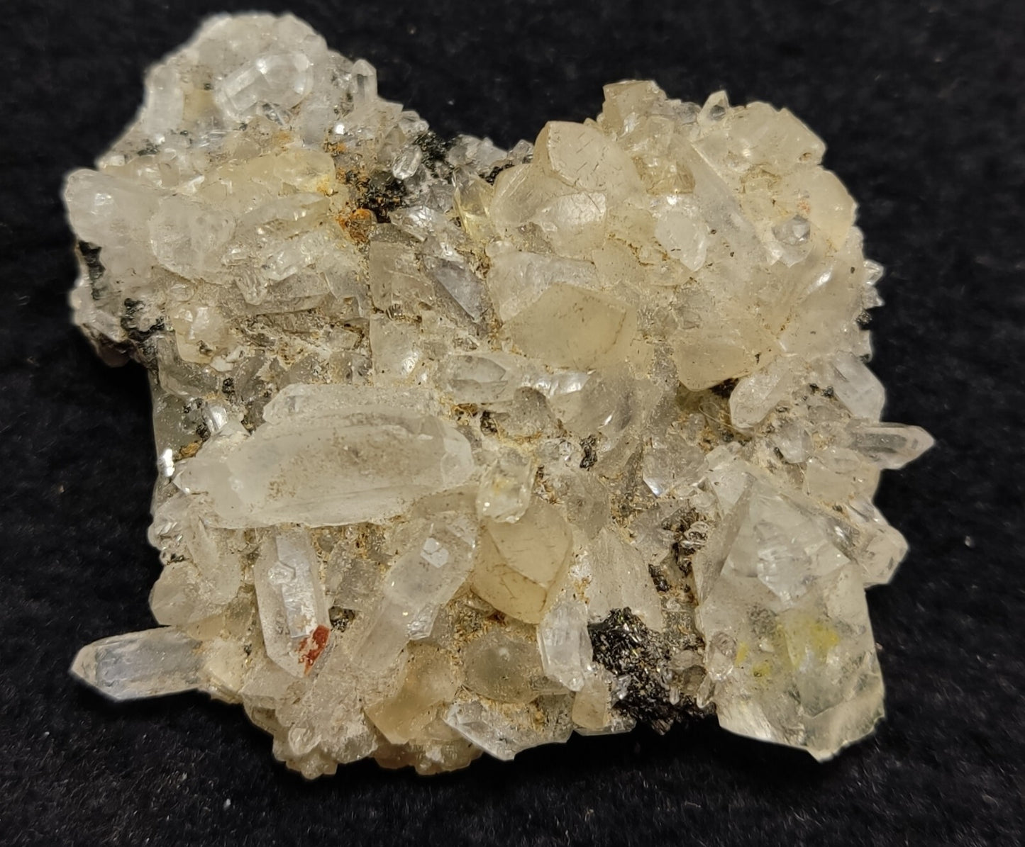 An Aesthetic quartz/calcite crystal specimen with petroleum inclusions 28 grams