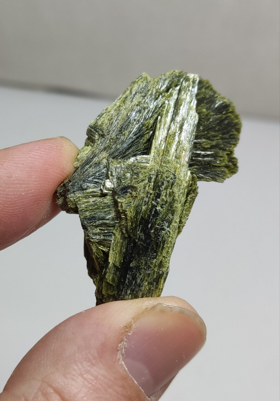 An aesthetic specimen of epidote crystal spray type 29 grams