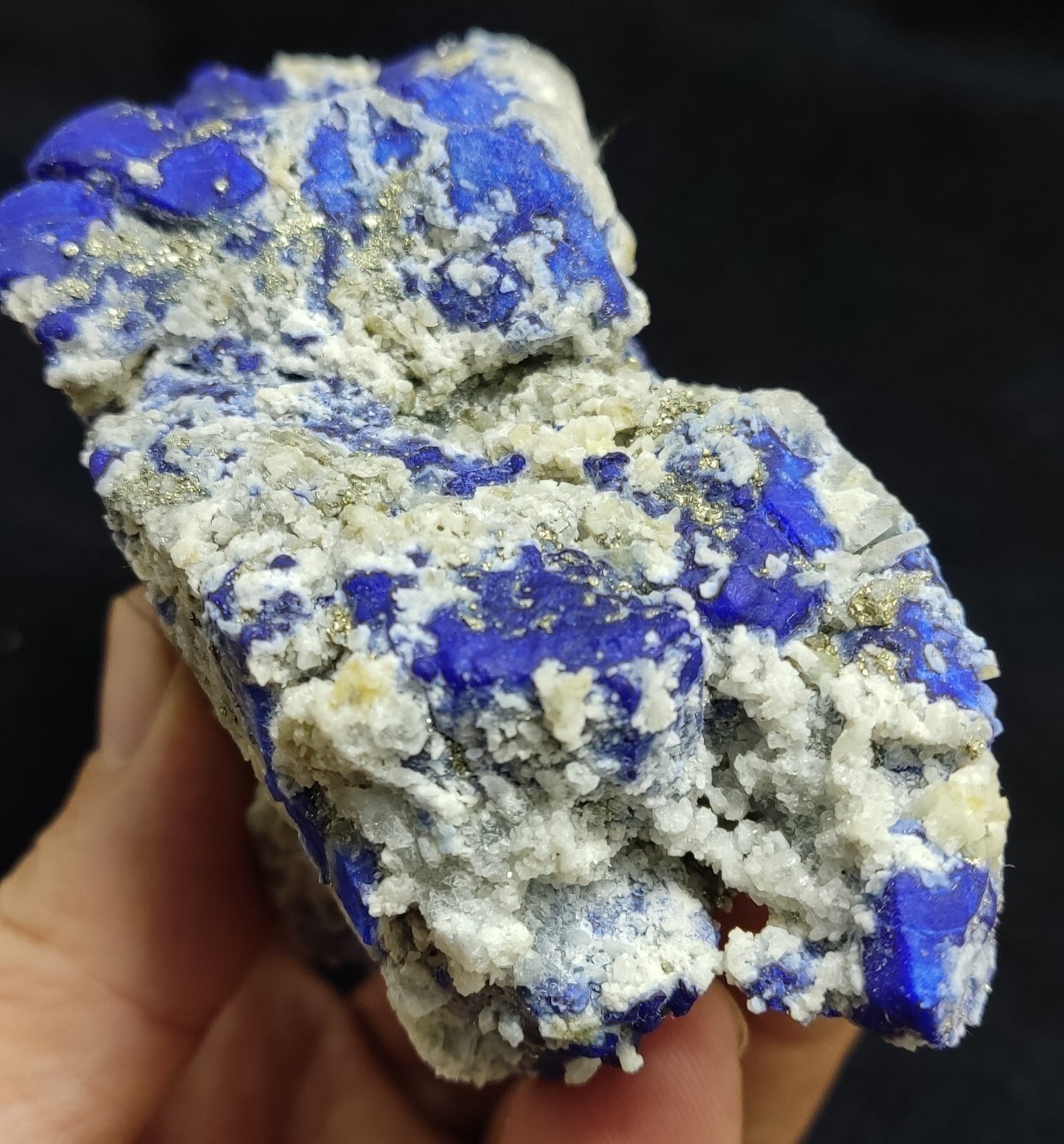 An Aesthetic specimen of fluorescent Lazurite with pyrite 489 grams