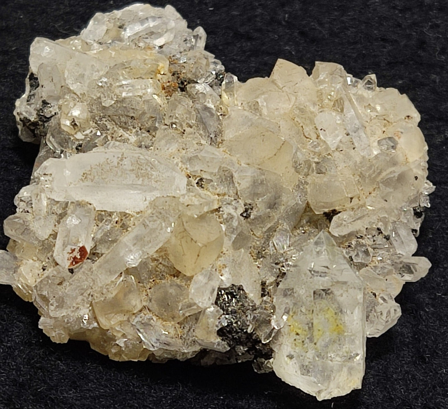 An Aesthetic quartz/calcite crystal specimen with petroleum inclusions 28 grams