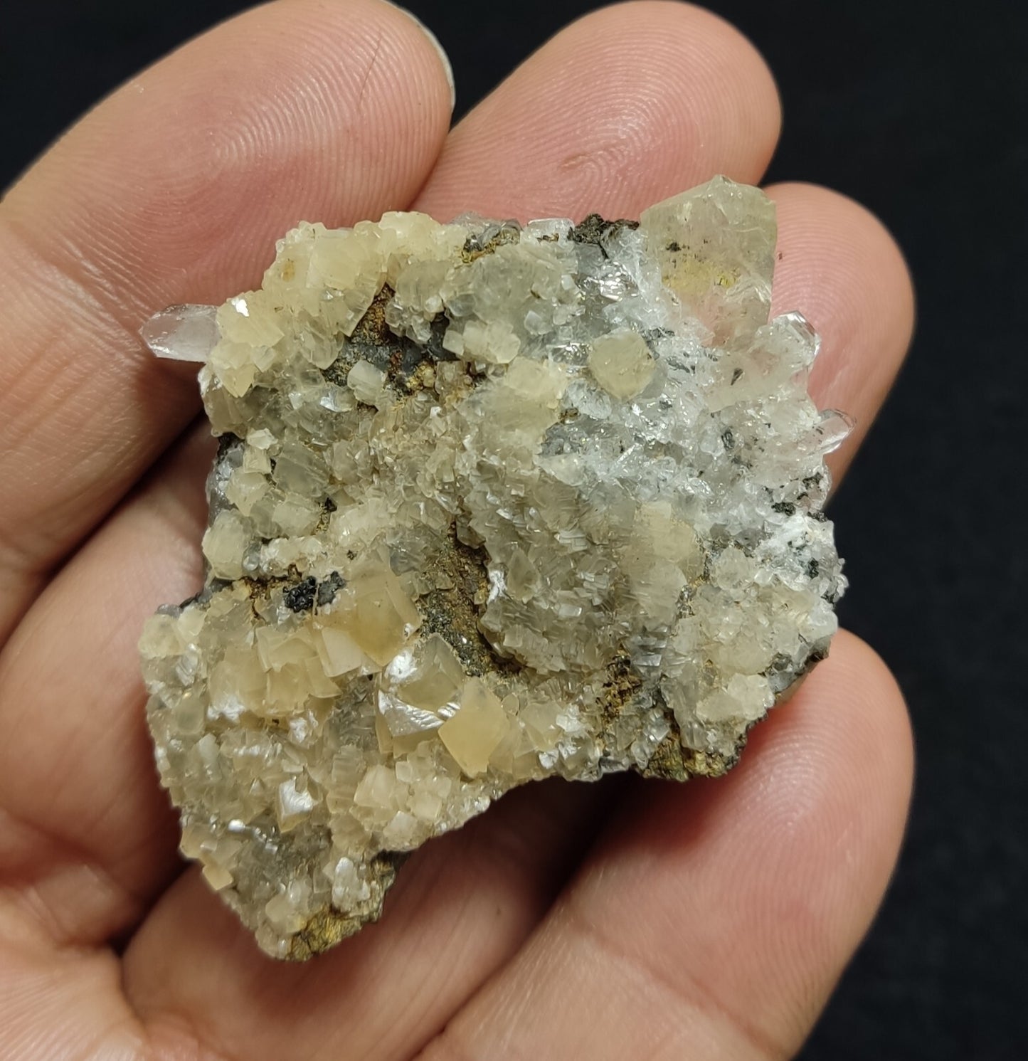 An Aesthetic quartz/calcite crystal specimen with petroleum inclusions 28 grams