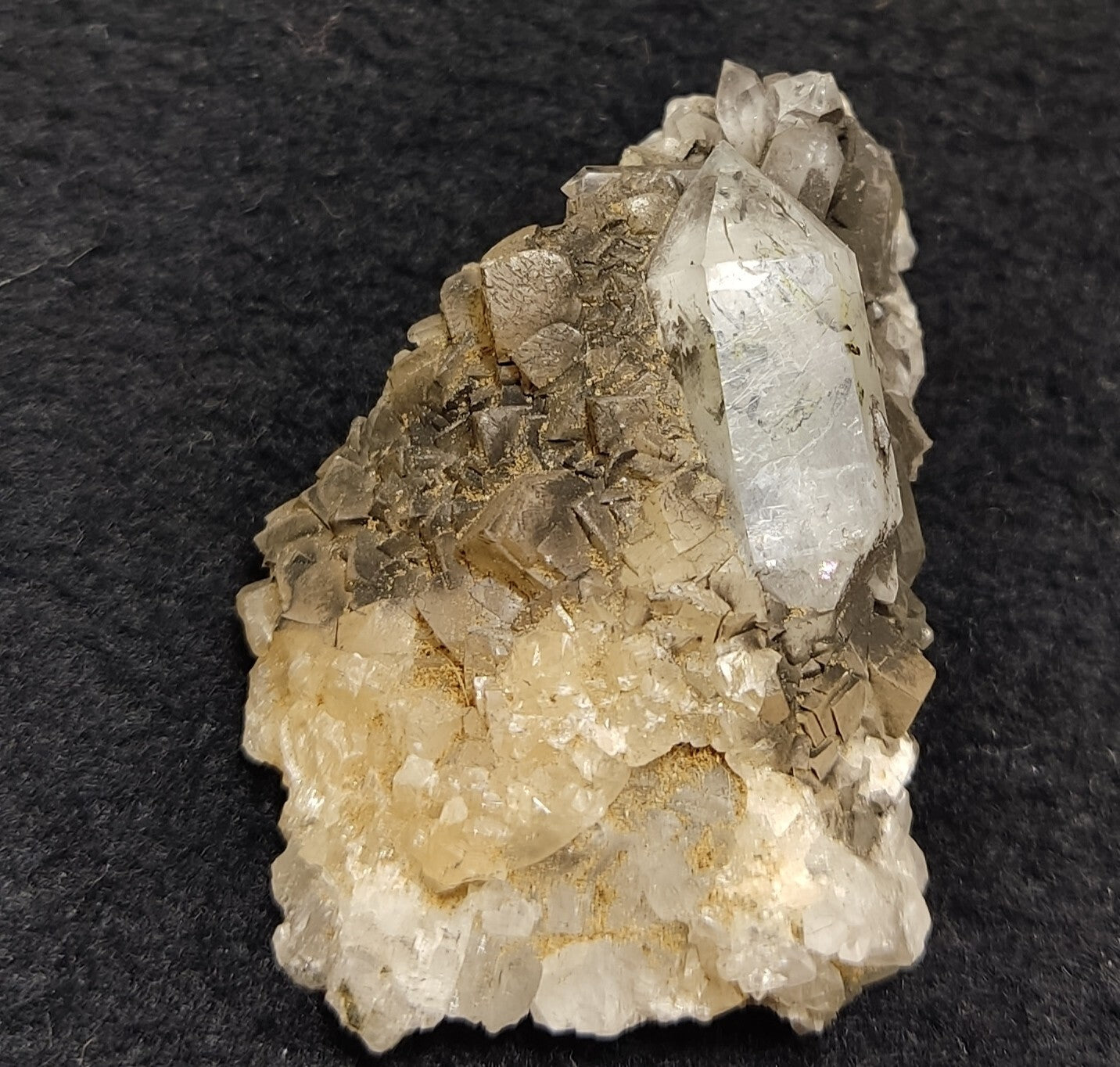 An Aesthetic quartz/calcite crystal specimen with petroleum inclusions 23 grams