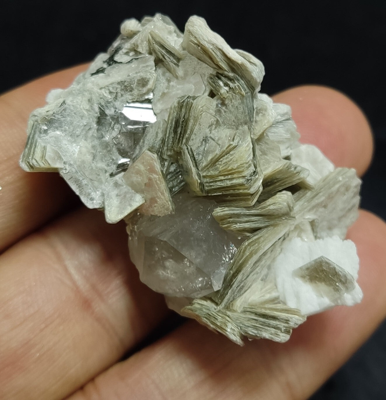28 grams An Aesthetic specimen of muscovite with Tourmaline, albiteand quartz