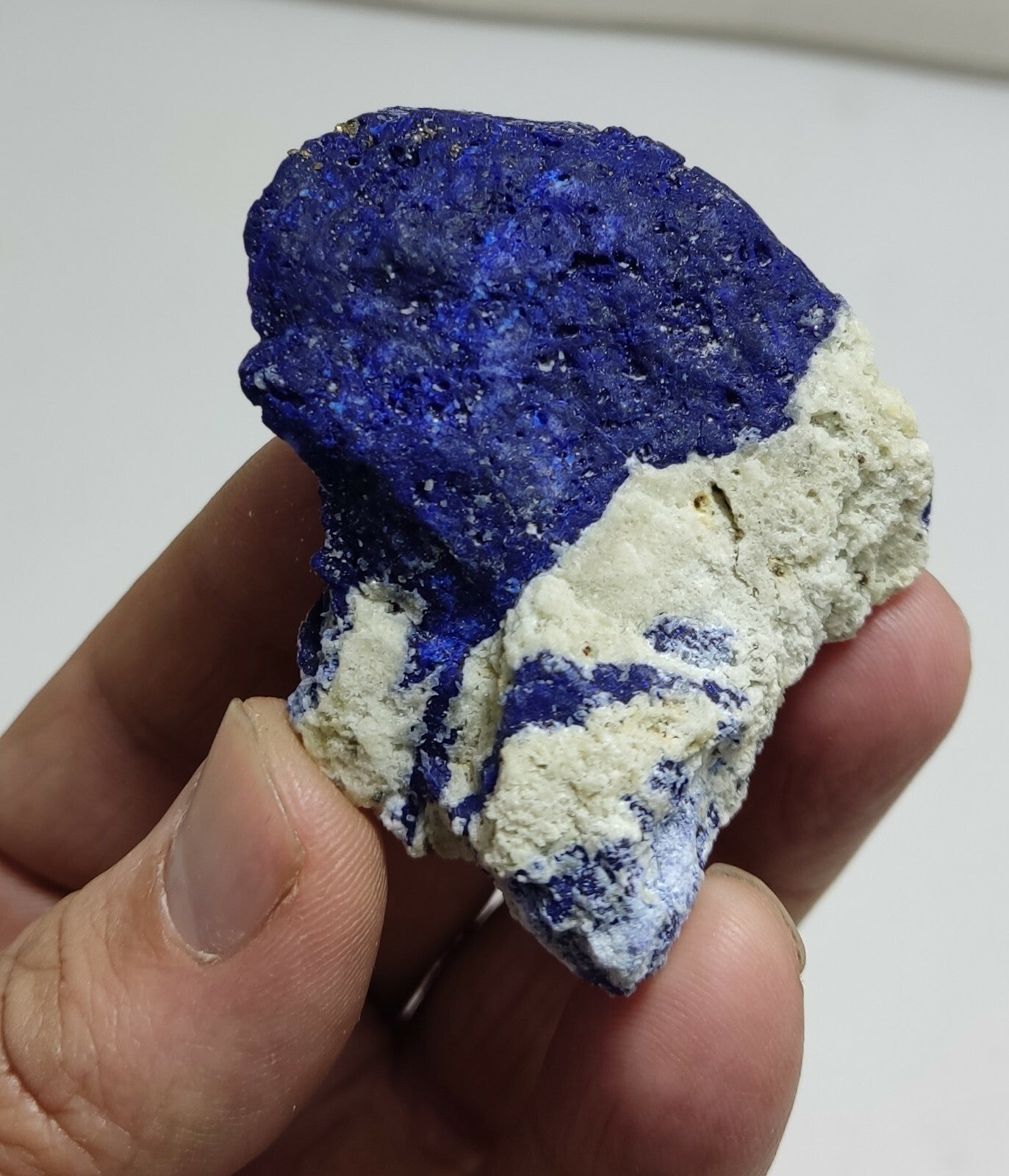 An Aesthetic specimen of fluorescent Lazurite with Pyrite 62 grams