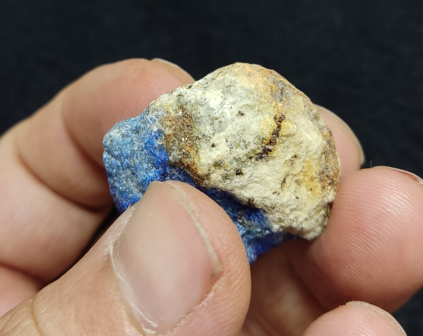 An Aesthetic specimen of fluorescent lapis/lazurite on matrix 23 grams