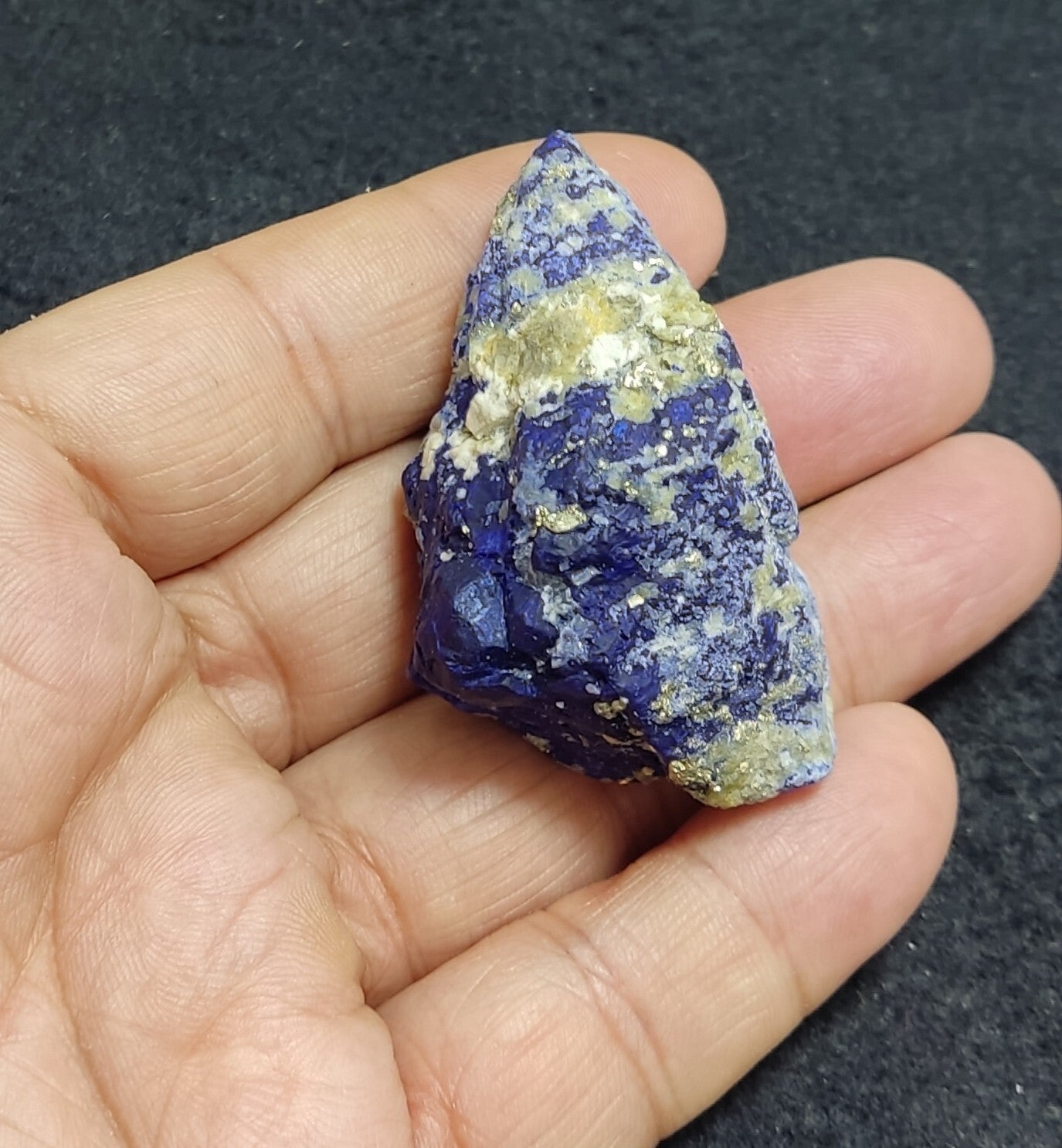 An Aesthetic specimen of fluorescent Lazurite with pyrite 65 grams