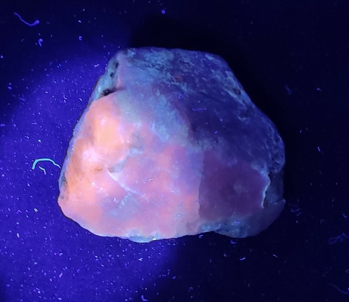 An amazing specimen of rough hackmanite chunk Tenebrescent 48 grams