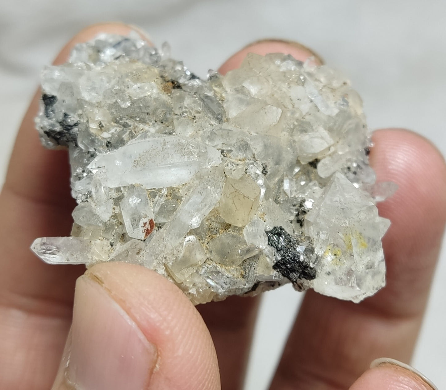 An Aesthetic quartz/calcite crystal specimen with petroleum inclusions 28 grams