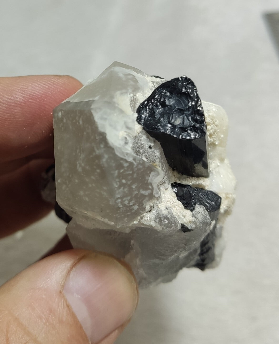 Natural quartz crystal with black tourmaline 145 grams