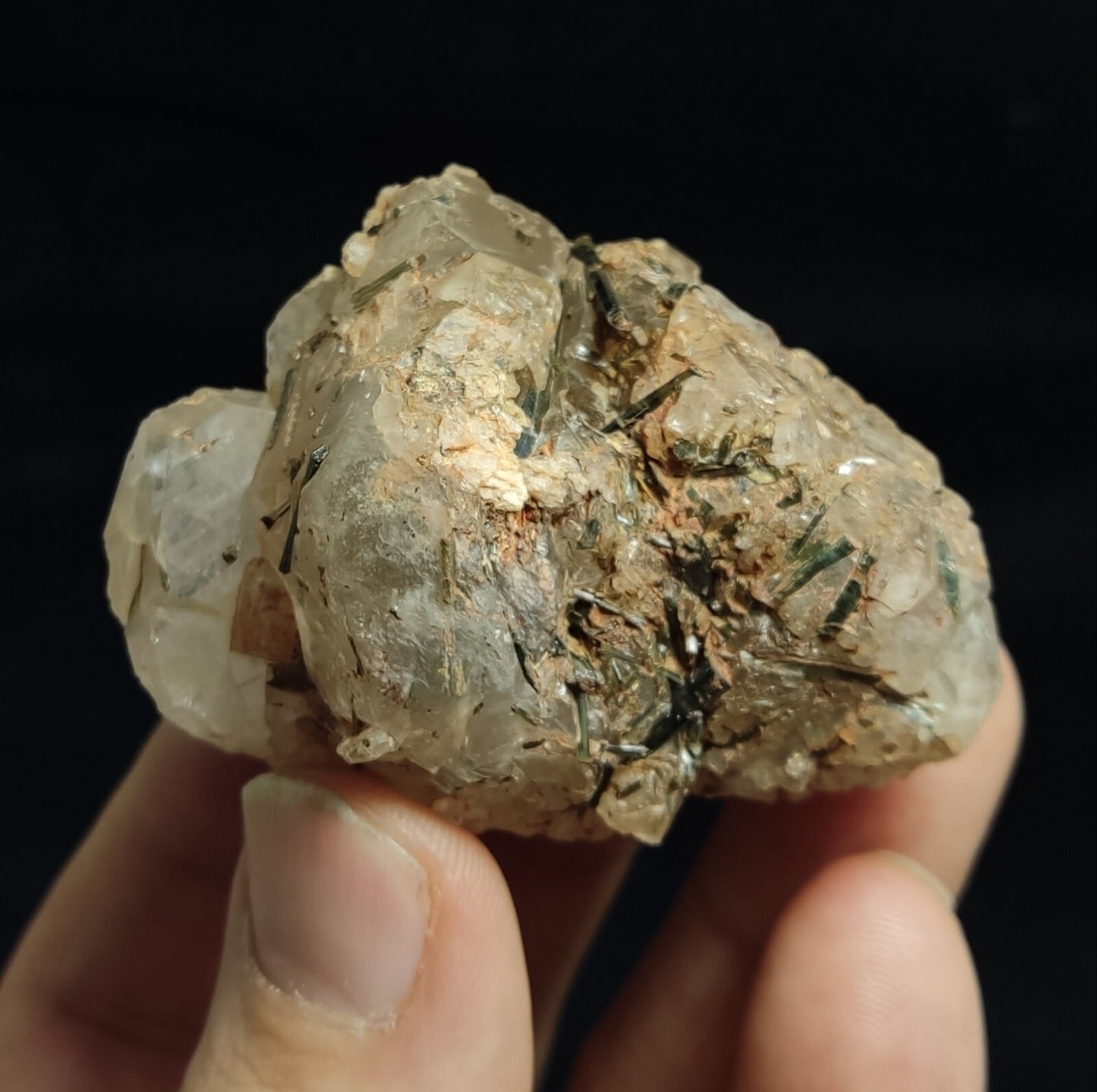 An Aesthetic terminated Quartz floater with aegirine inclusions 98 grams