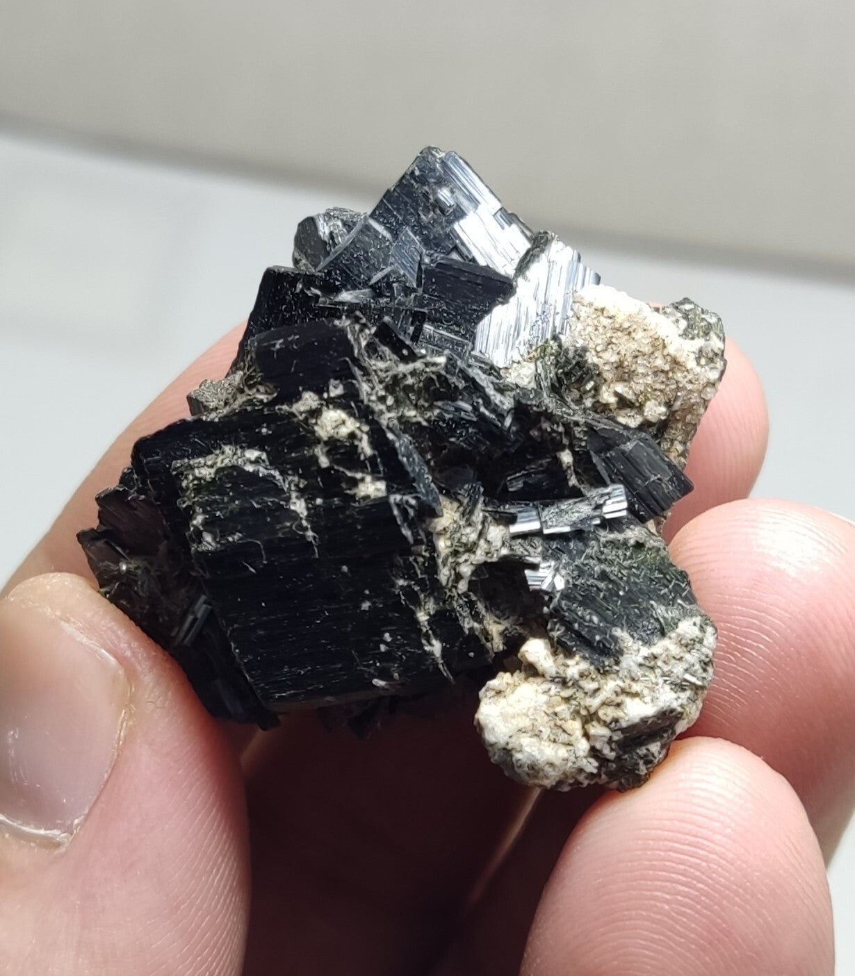 An aesthetic specimen of terminated aegirine crystal cluster 25 grams