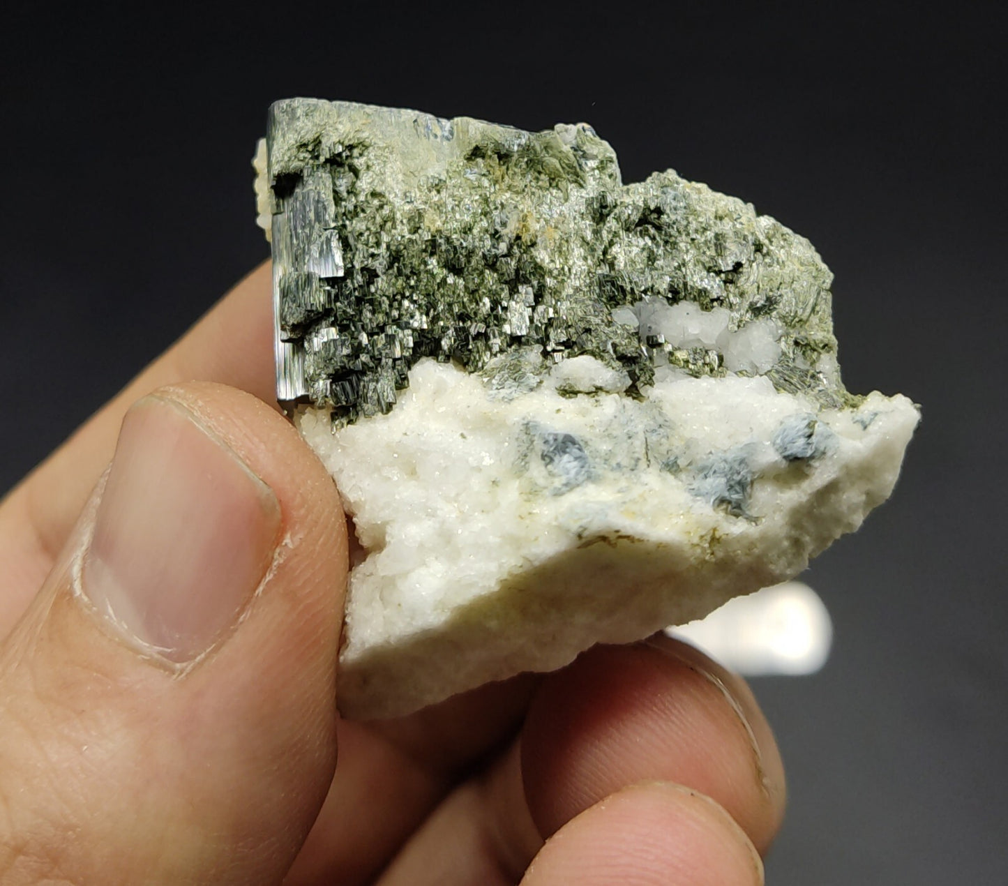 An Aesthetic specimen of epidote in matrix 39 grams
