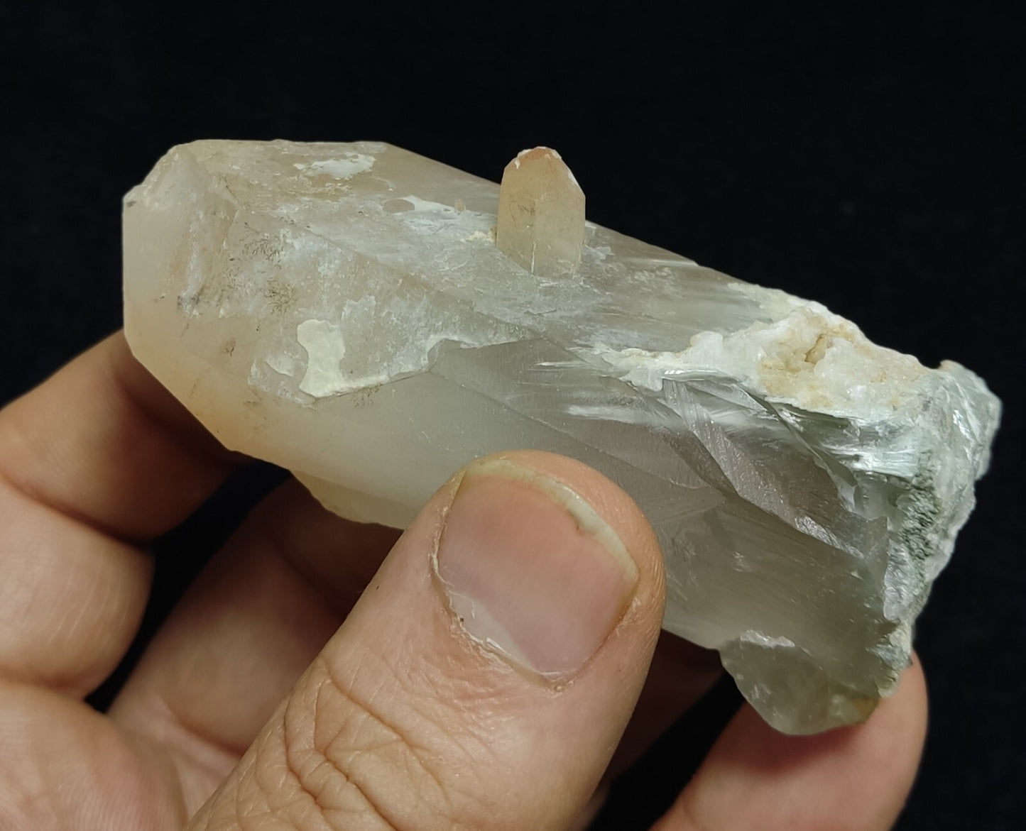 140 grams natural quartz crystal with amphibole inclusions