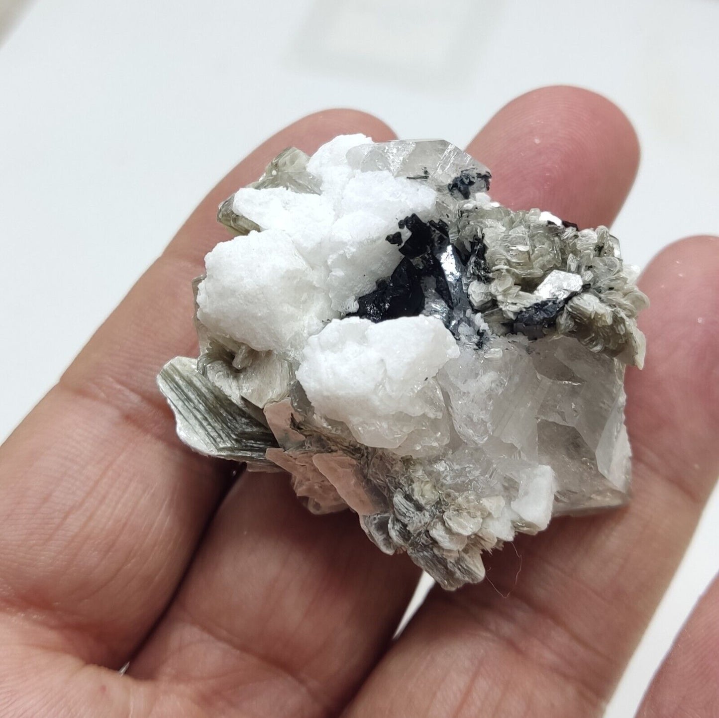 An Aesthetic specimen of muscovite with quartz, Tourmaline and albite 49 grams