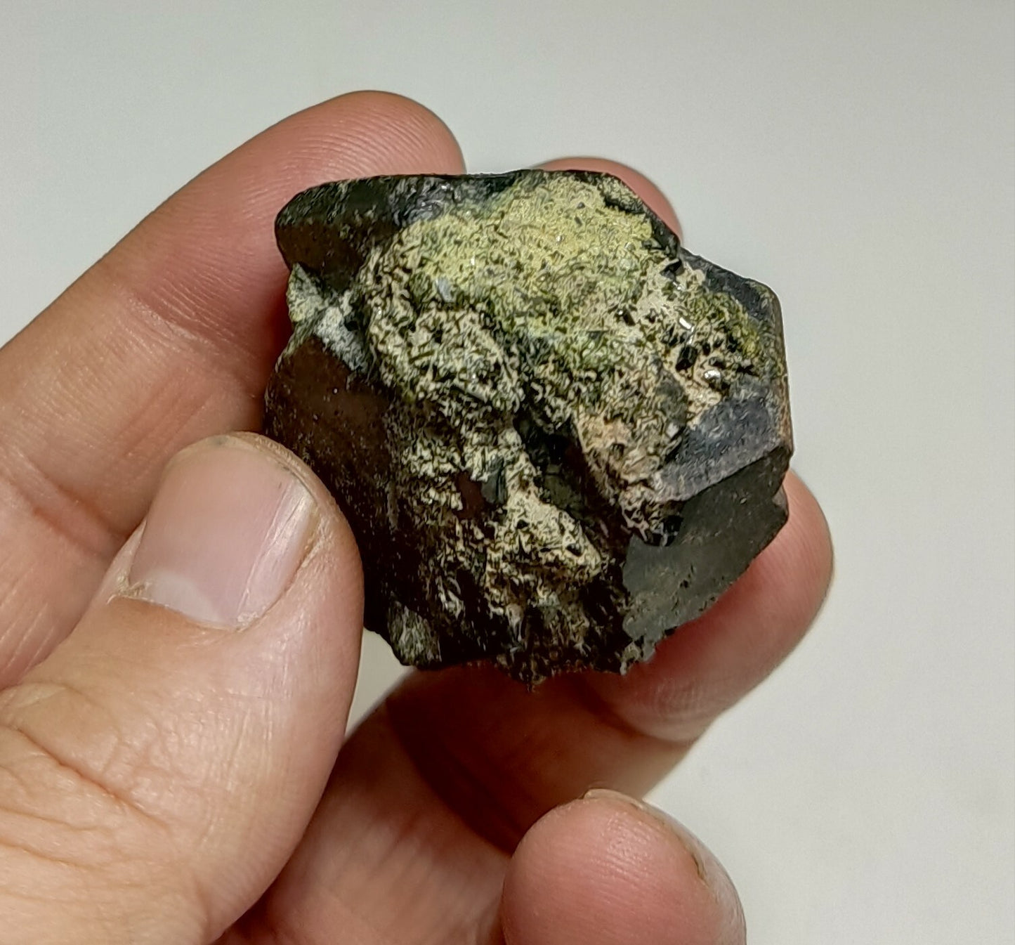 An aesthetic specimen of dark green color Epidote crystals 79 grams
