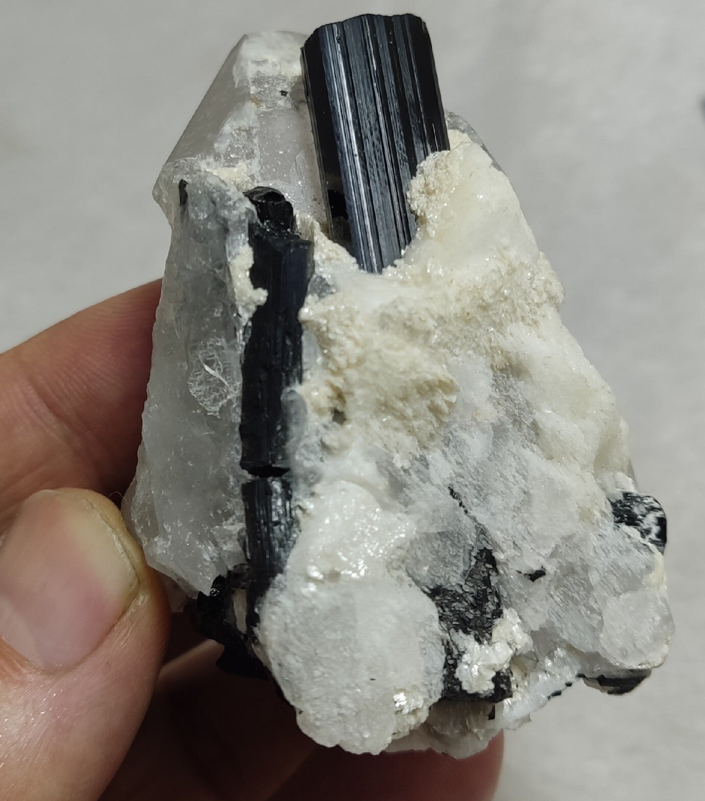 Natural quartz crystal with black tourmaline 145 grams