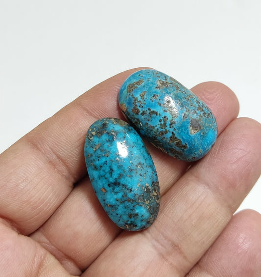 Two turquoise cabochons 22.5 grams both