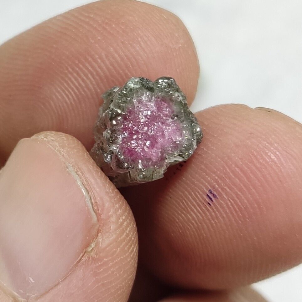 23 grams, 7 tourmaline crystals