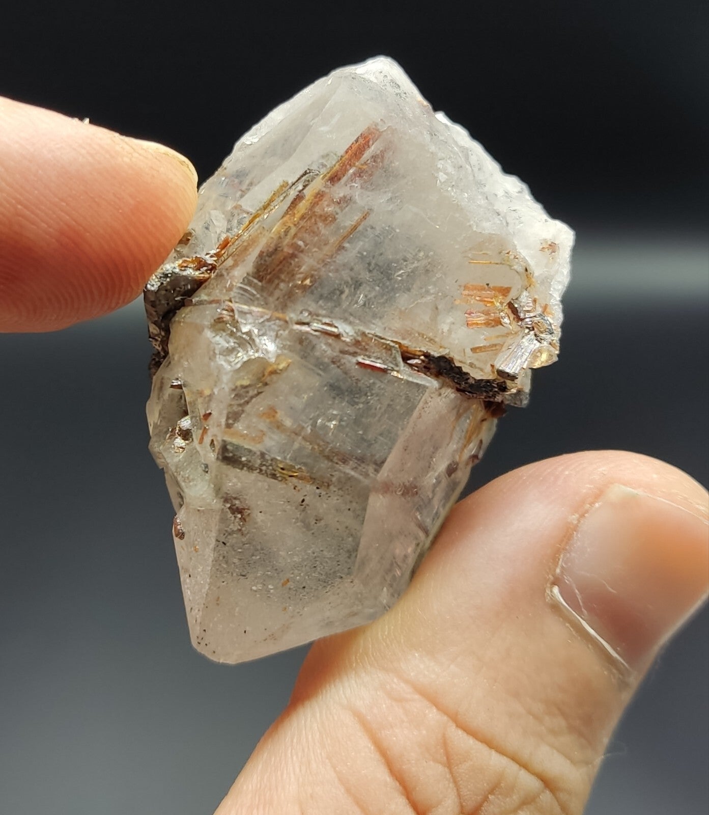 An aesthetic specimen of quartz with hematite and rutile inclusions 28 grams