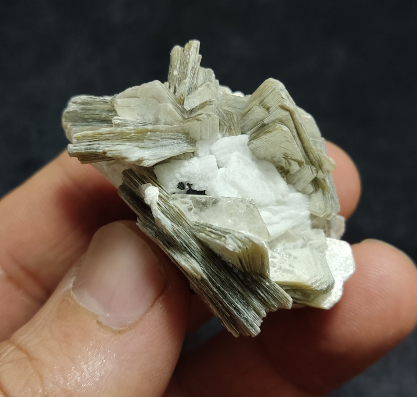 An Aesthetic specimen of muscovite with Tourmaline and albite 27 grams