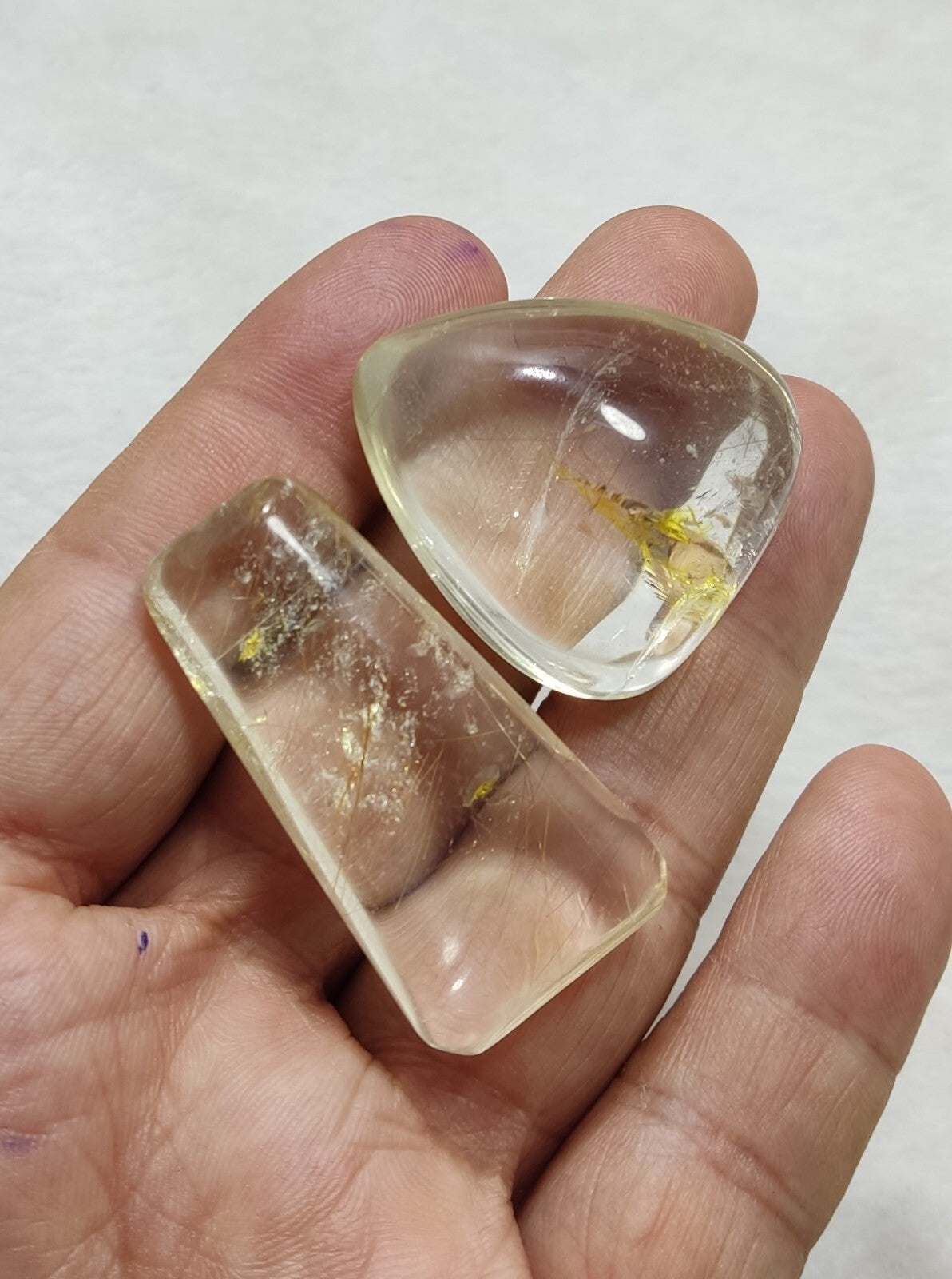 An amazing collection of 2 Rutilated polished quartz tumbles 46 grams