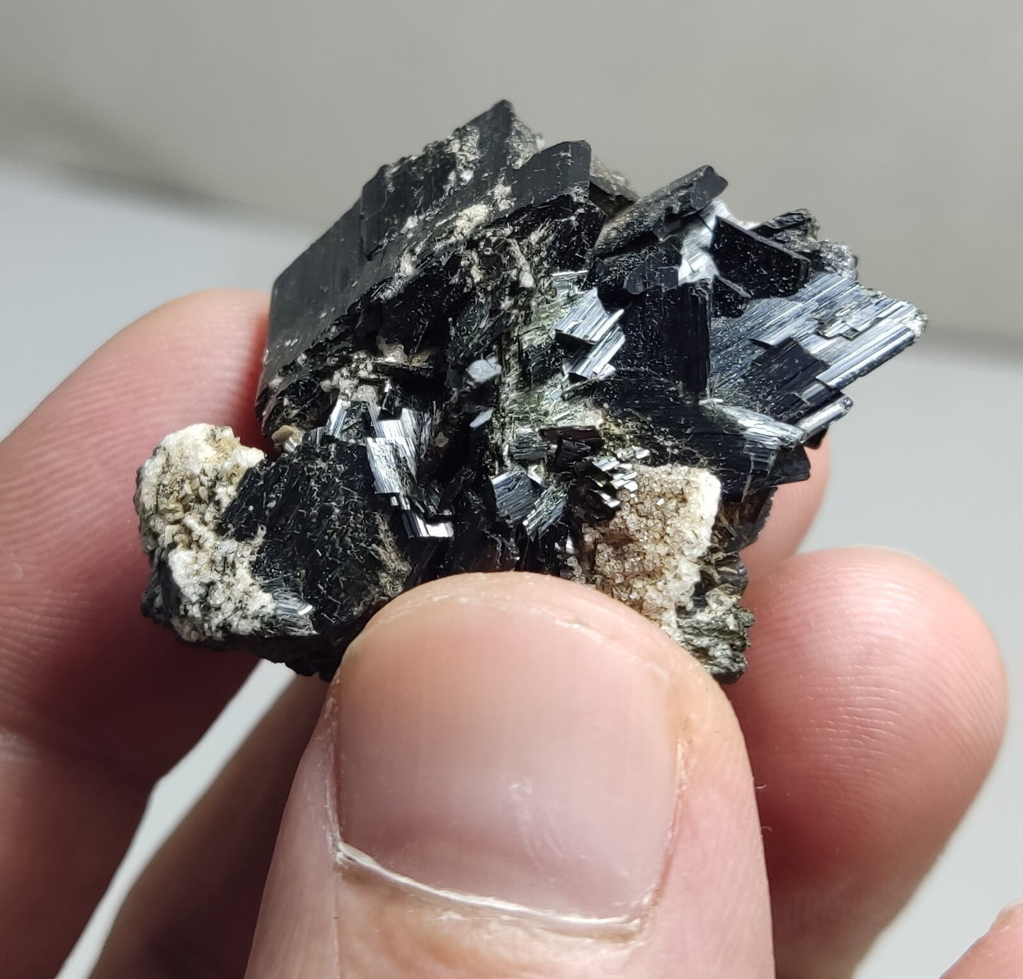 An aesthetic specimen of terminated aegirine crystal cluster 25 grams