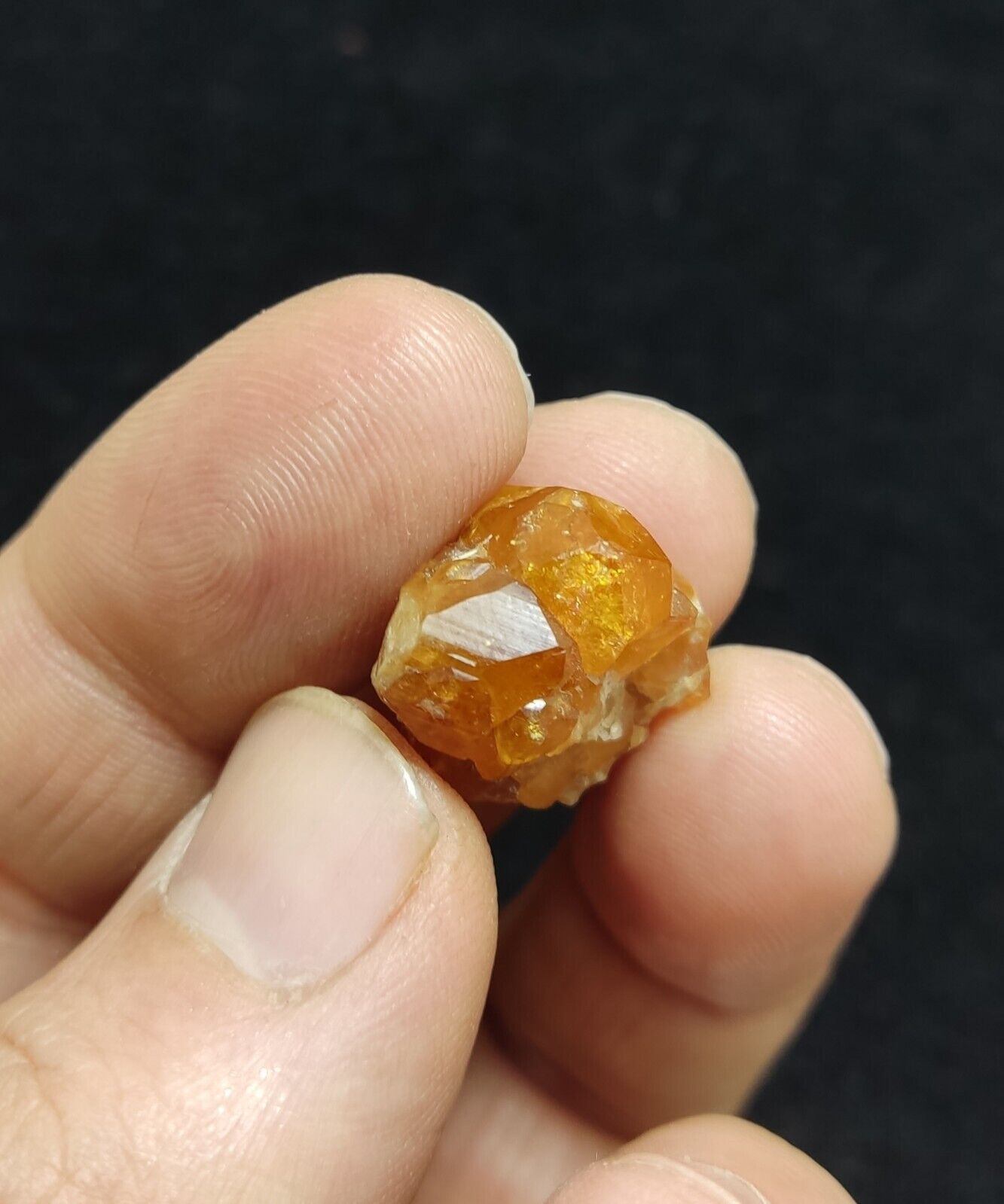 A selection of three garnet variety hessonite crystals 14.8 grams