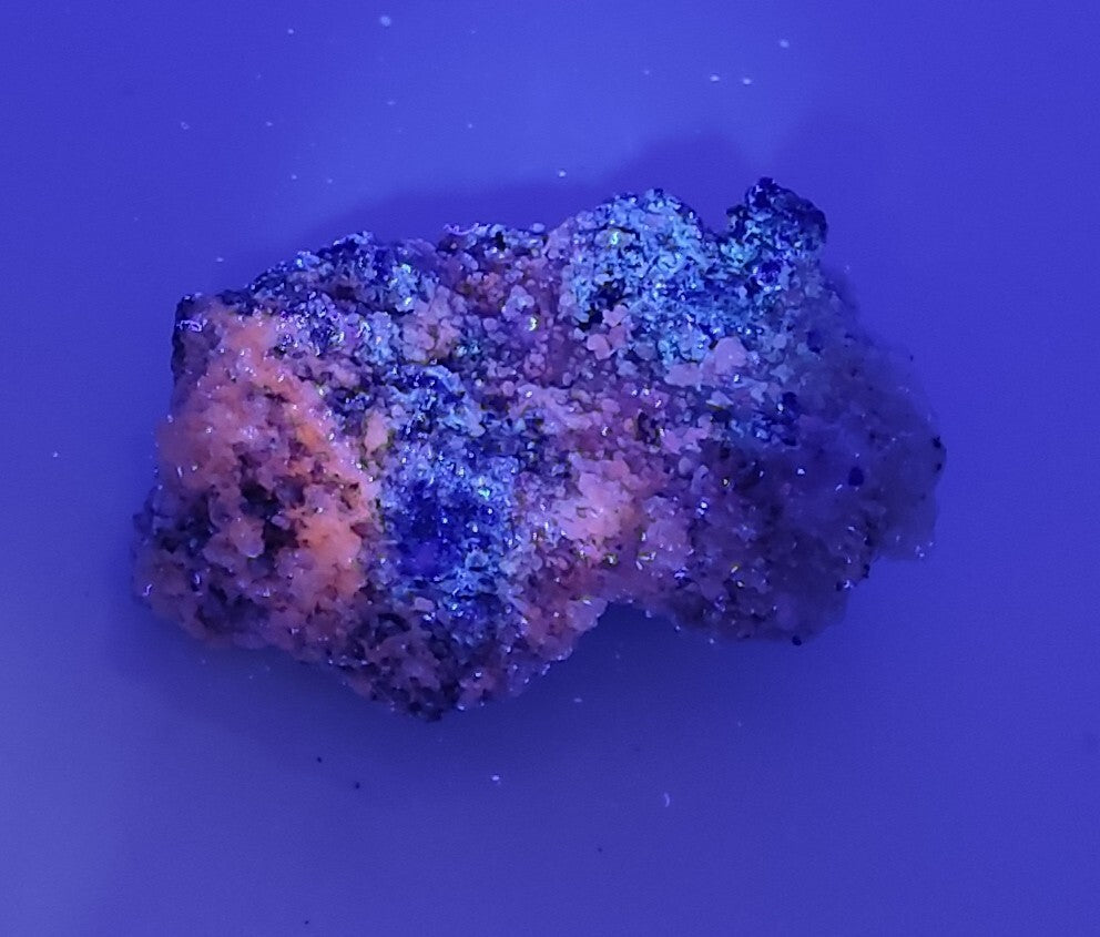 An Aesthetic specimen of fluorescent Lazurite with pyrite 112 grams