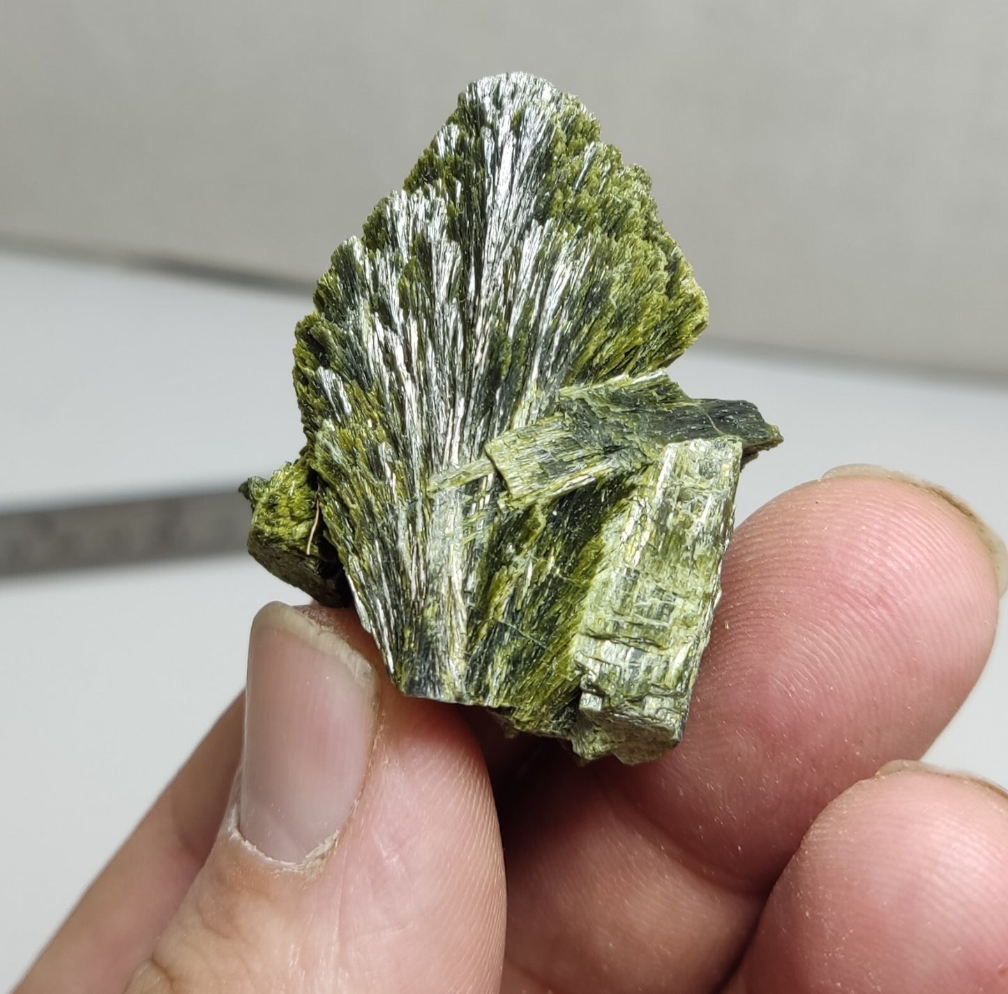 An aesthetic specimen of epidote crystal spray type 27 grams
