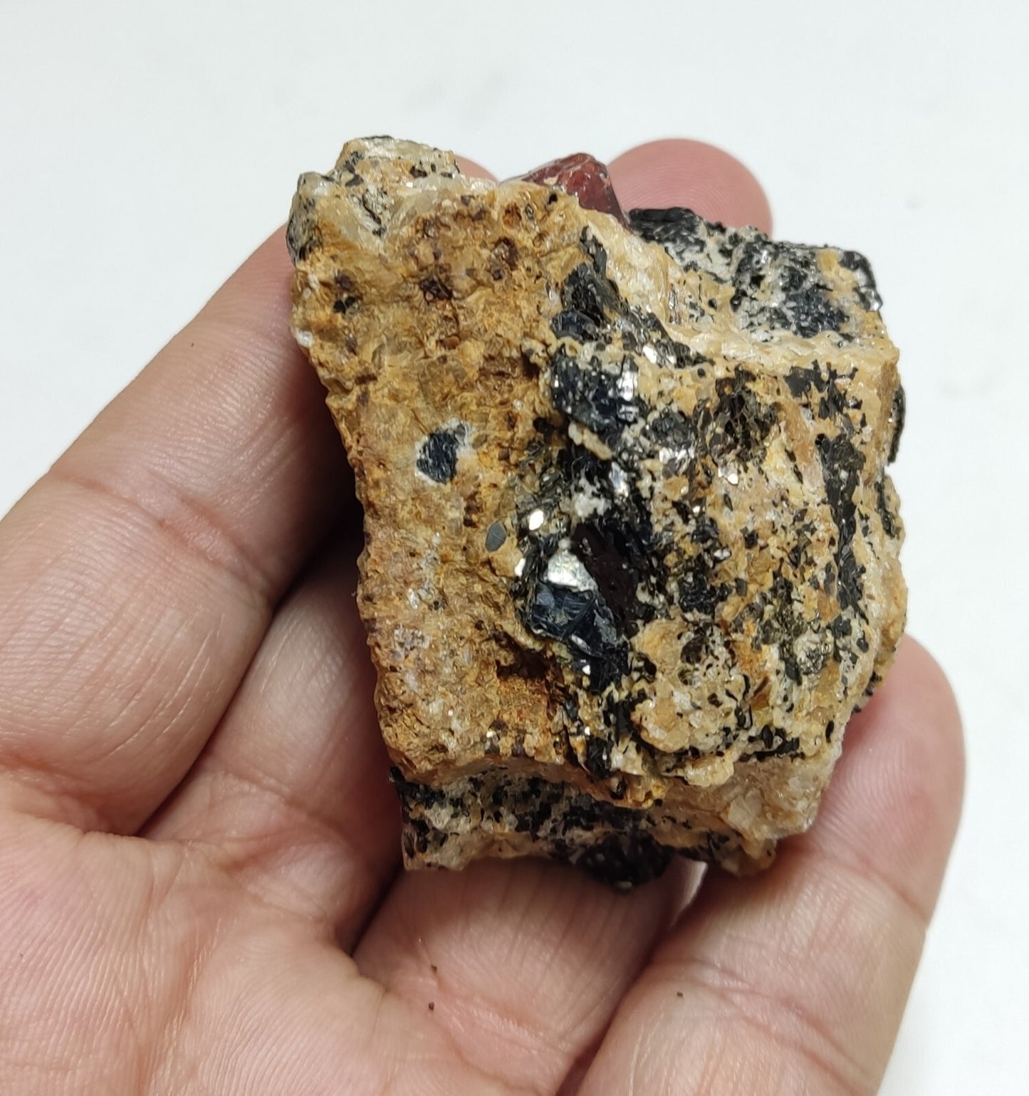 An Aesthetic specimen of zircon crytsals with biotite 130 grams