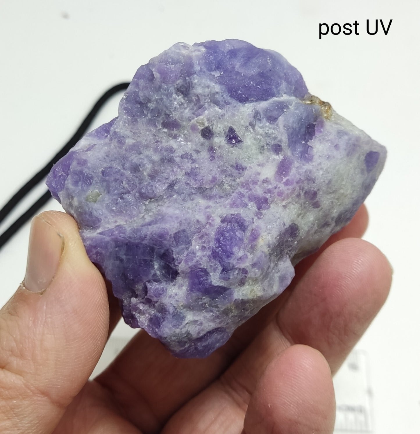 An amazing specimen of hackmanite highly Tenebrescent 143 grams