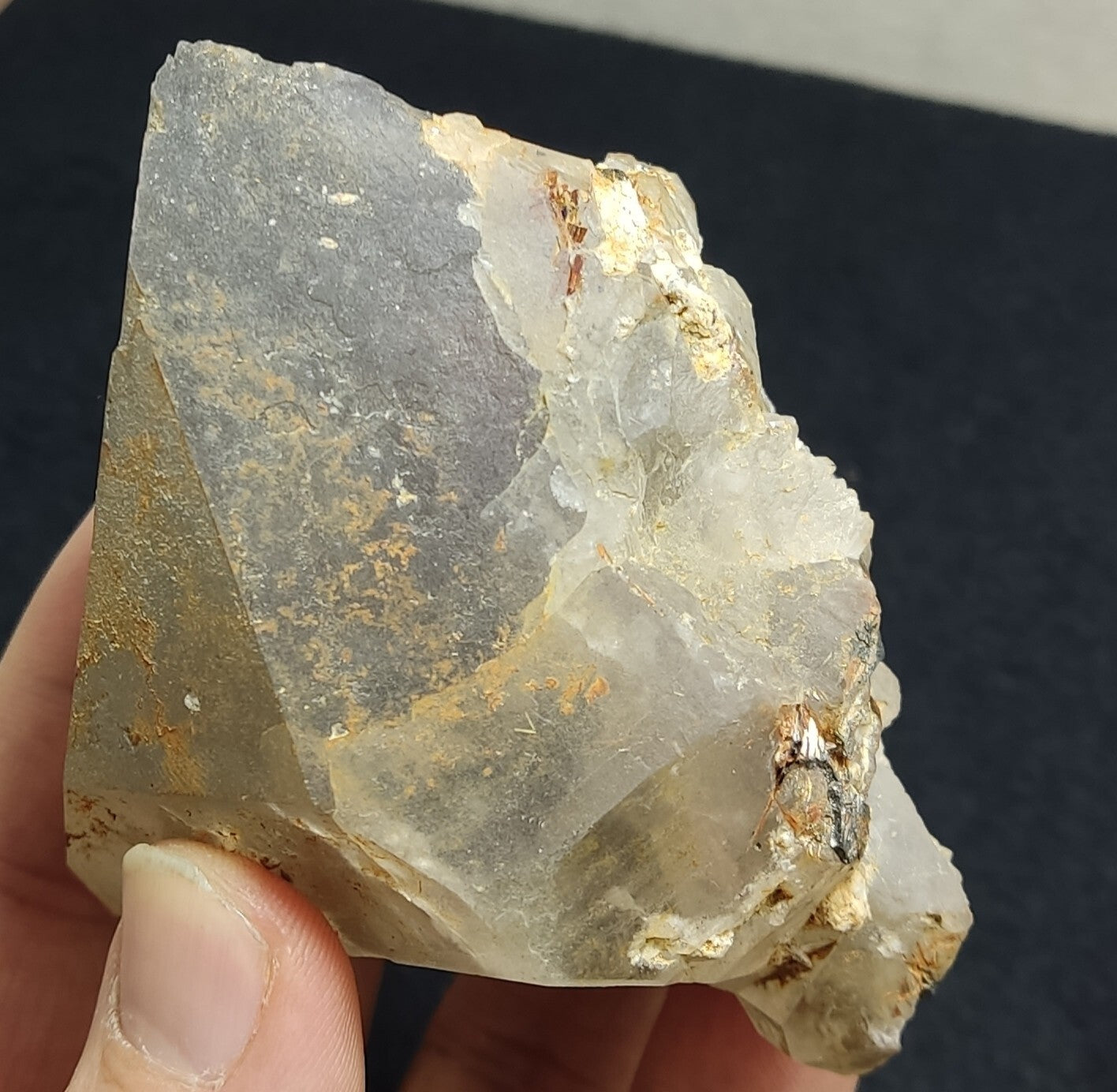 An Aesthetic terminated Quartz floater with rutiles and hematite 399 grams