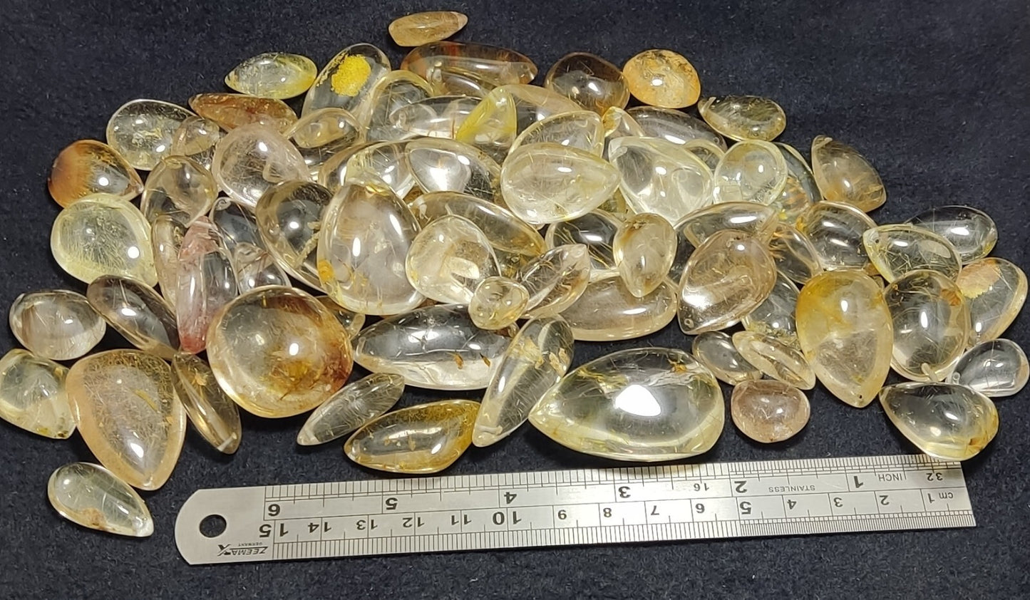525 grams Rutilated polished quartz tumbles-cabochons