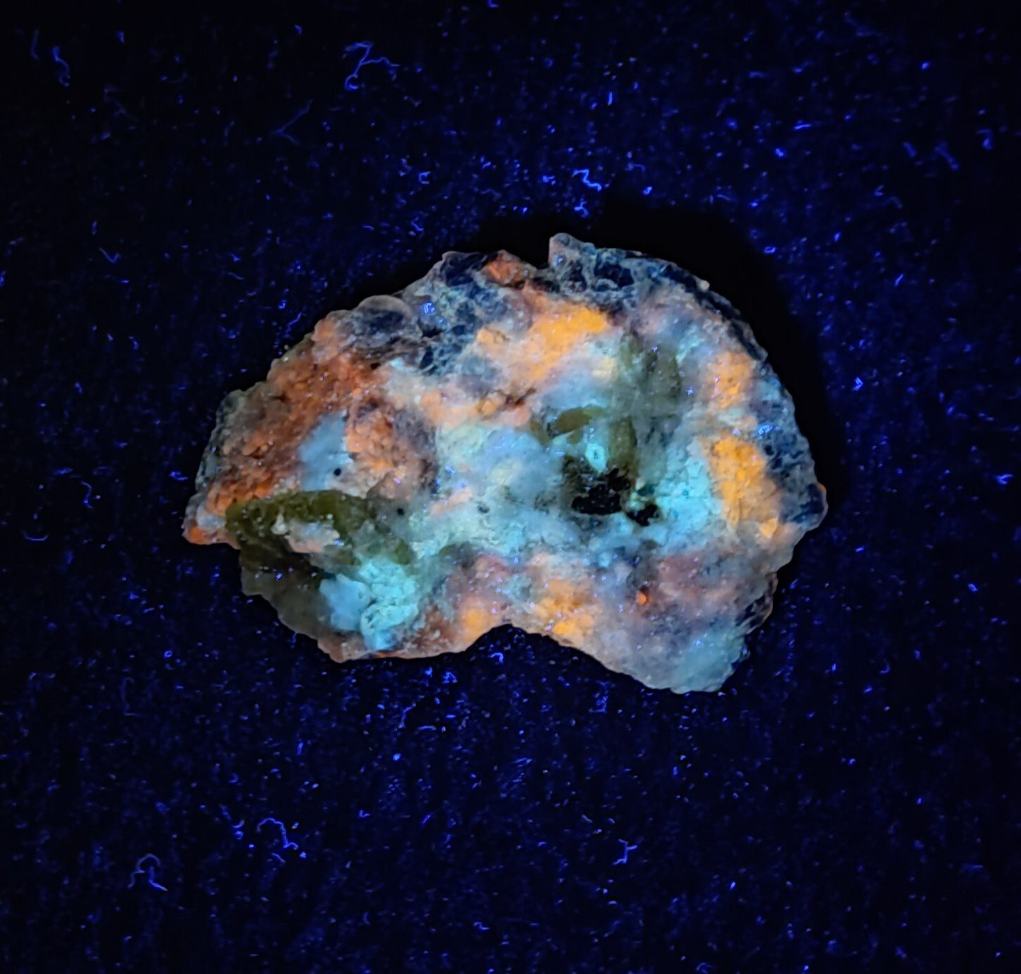 An Aesthetic specimen of fluorescent Lazurite 38 grams