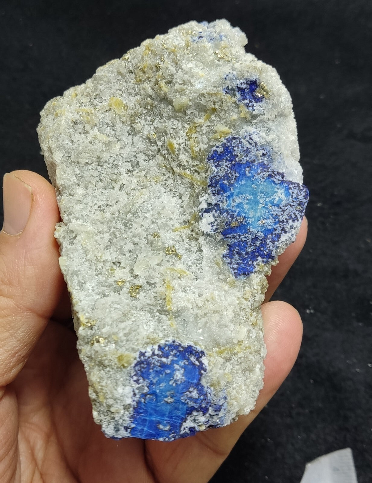 An Aesthetic specimen of fluorescent Lazurite with pyrite 415 grams