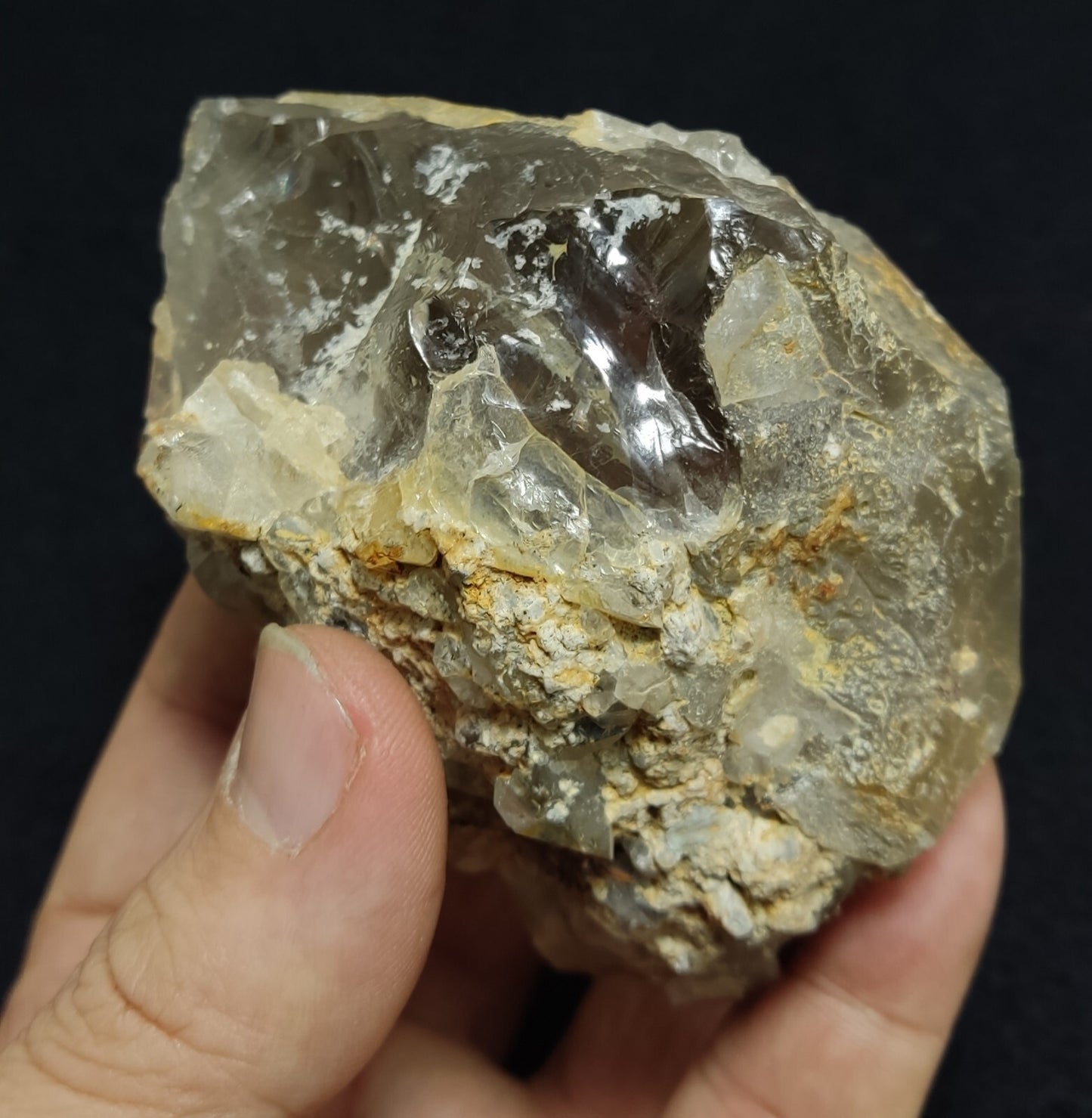 An Aesthetic terminated Quartz floater with rutiles and hematite 399 grams