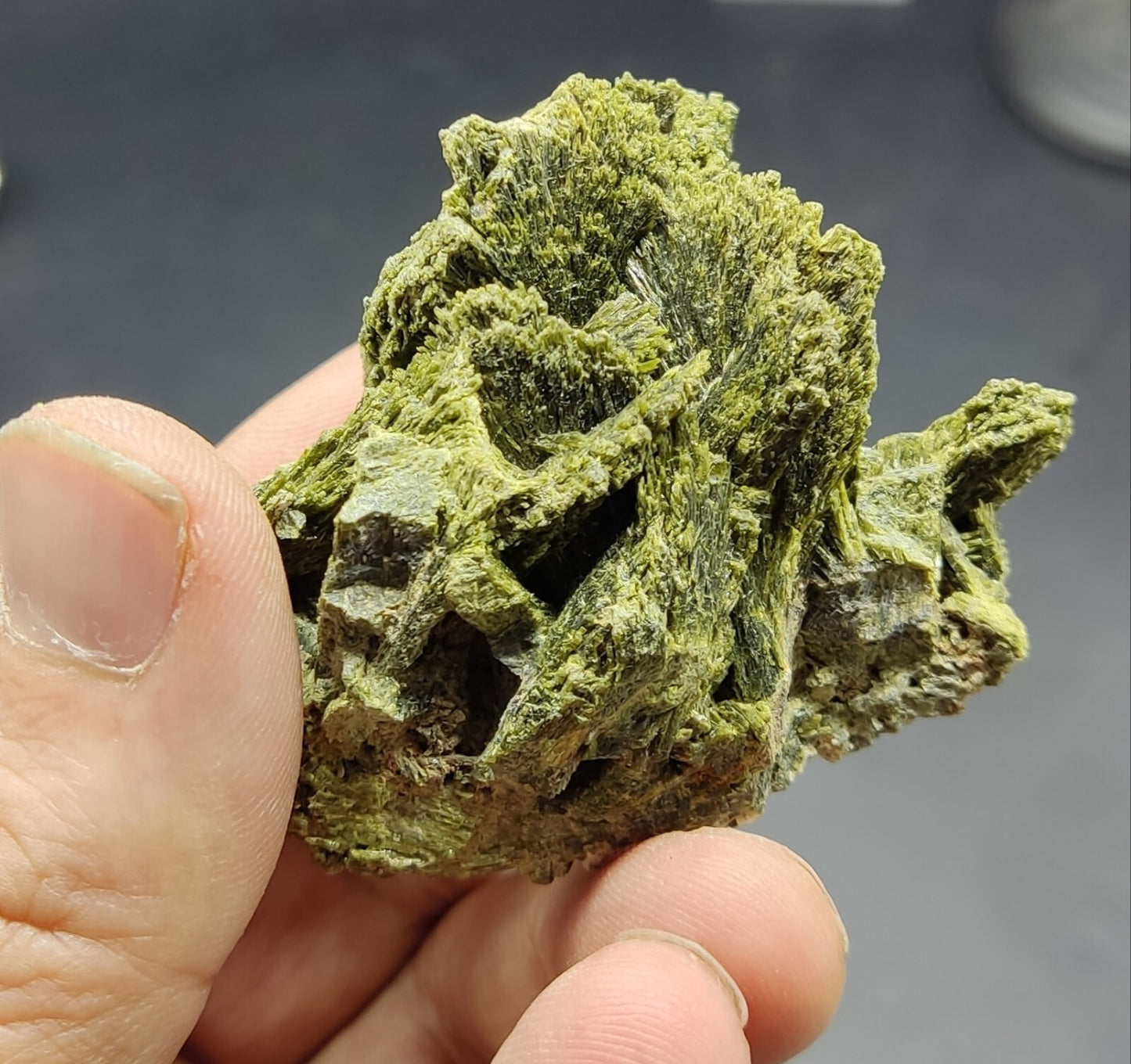 An aesthetic specimen of epidote crystal spray type 107 grams