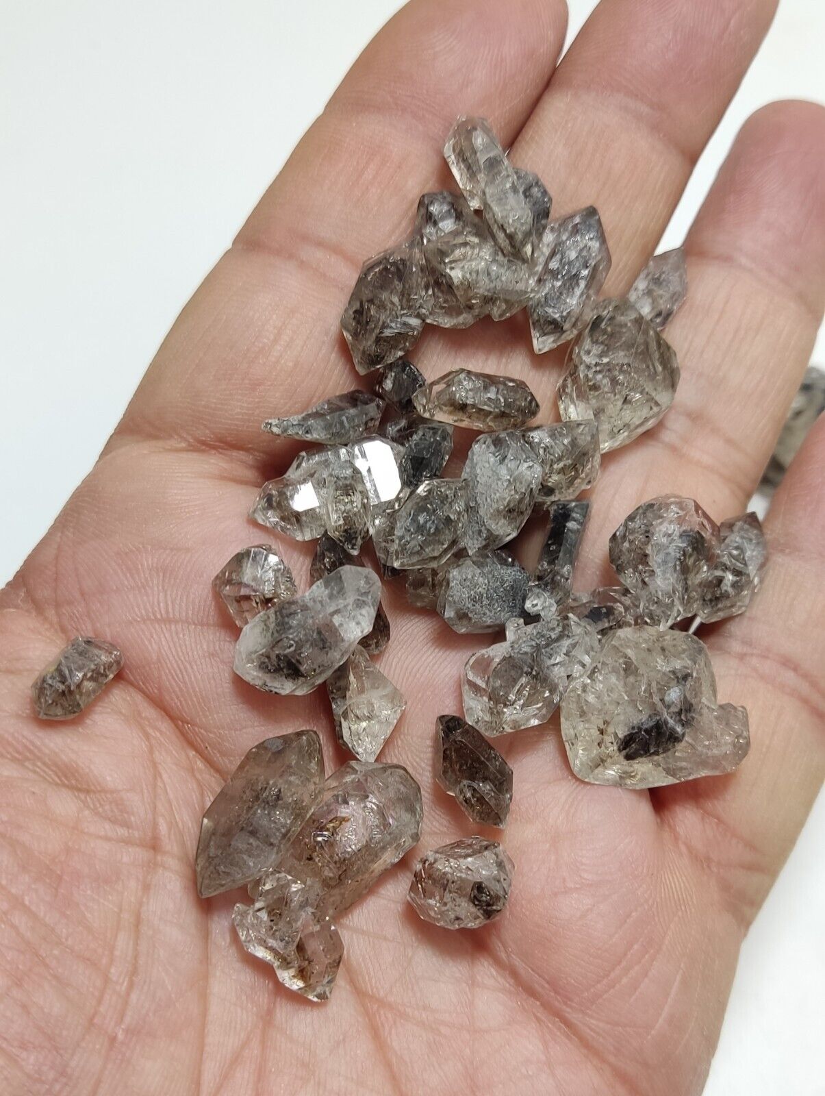 105 grams carbon included quartz crystals