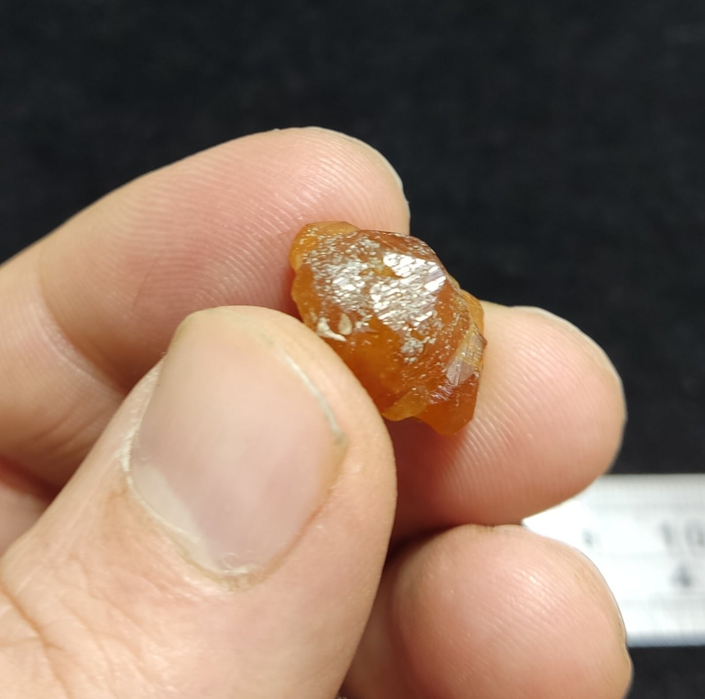A selection of three garnet variety hessonite crystals 14.8 grams