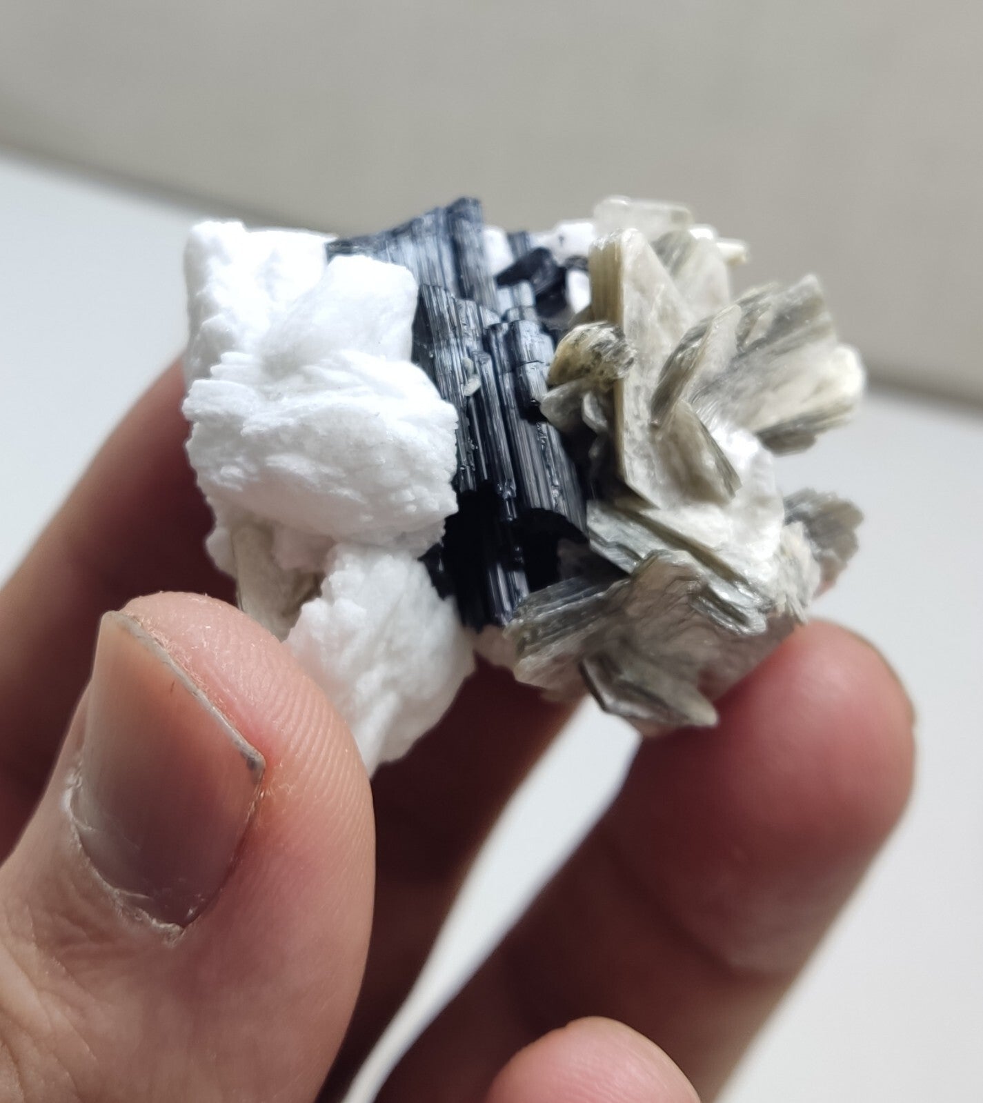 An Aesthetic specimen of muscovite with Tourmaline and albite 40 grams