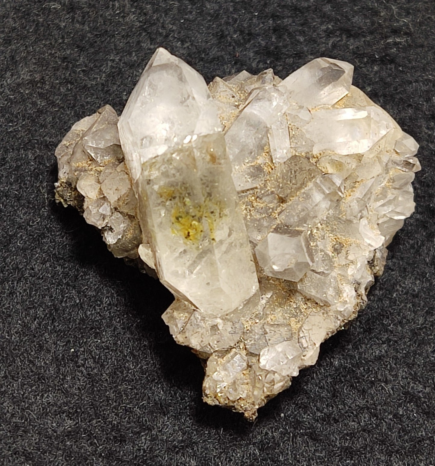 An Aesthetic quartz/calcite crystal specimen with petroleum inclusions 15 grams