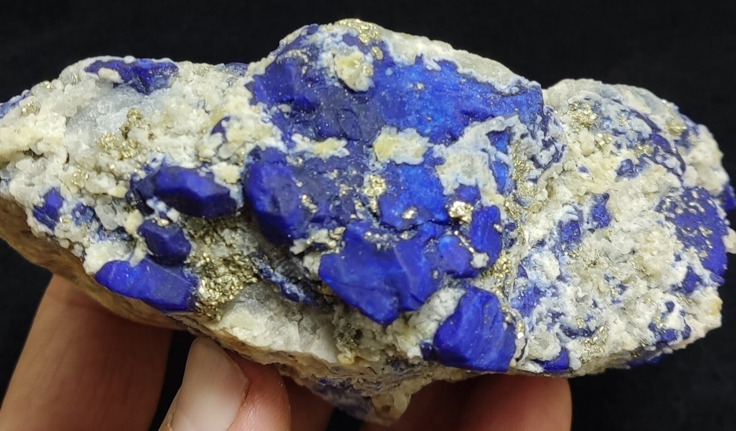 An Aesthetic specimen of fluorescent Lazurite with pyrite 489 grams