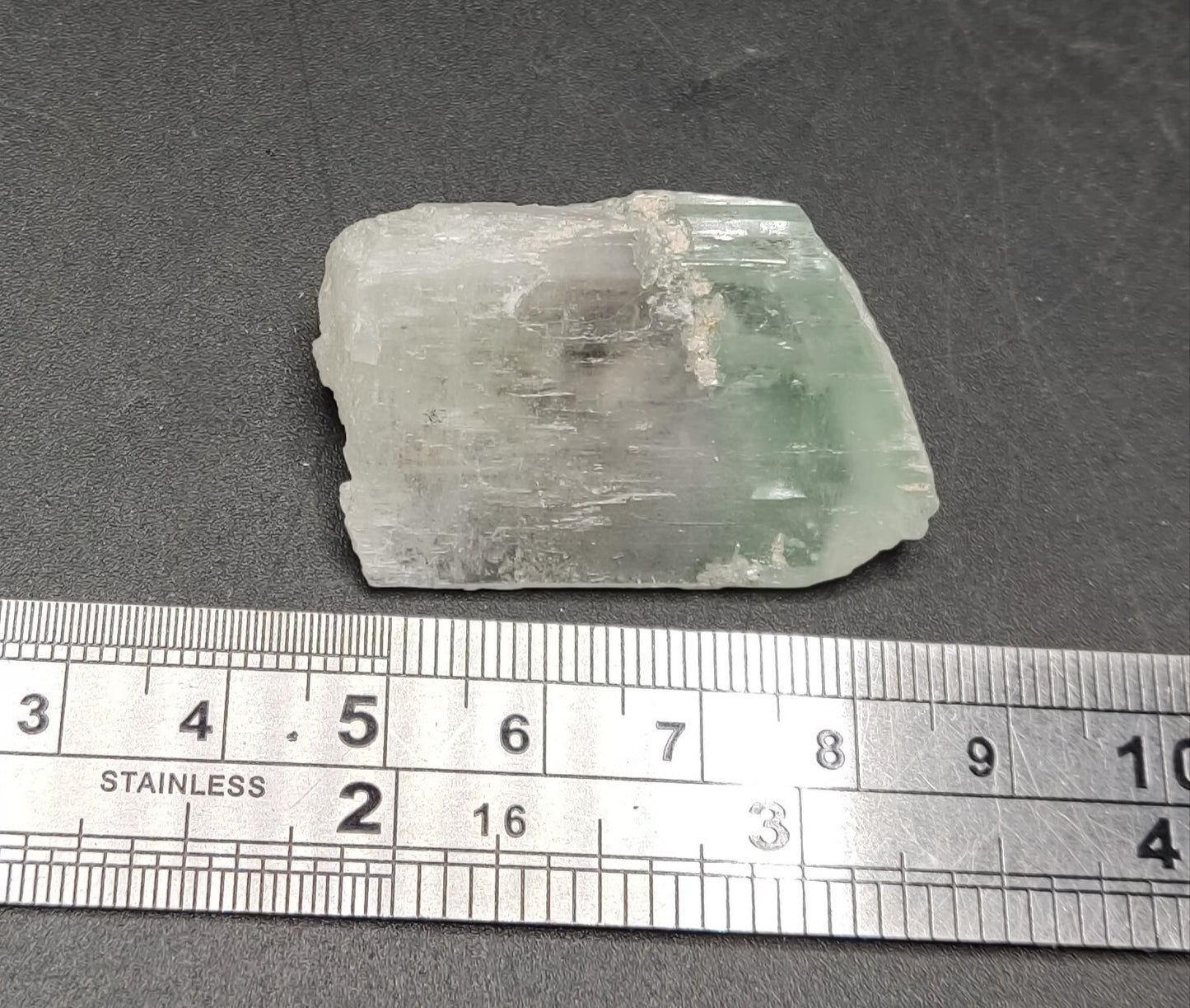 An Aesthetic terminated spodumene floater crystal specimen 22 grams